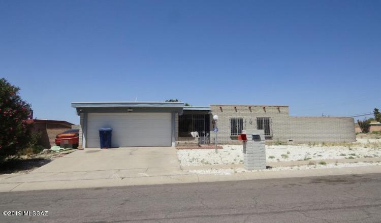 3 bedroom 2 bath, double garage.  Fireplace, Evap cooling.  Needs repairs.   Subject to the lender short sale approval