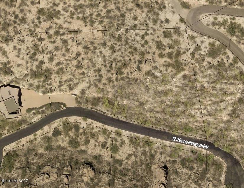 Spectacular chance to build a custom home in the prestigious guard gated community of Ventana Canyon. Lot sits high in neighborhood and has sensational mountain and city views. Golf and other World Class amenities at Ventana Canyon Country Club. Minutes from restaurants and shopping at Sunrise and Kolb. Don't miss this chance to build your dream home. Come view before it's gone.