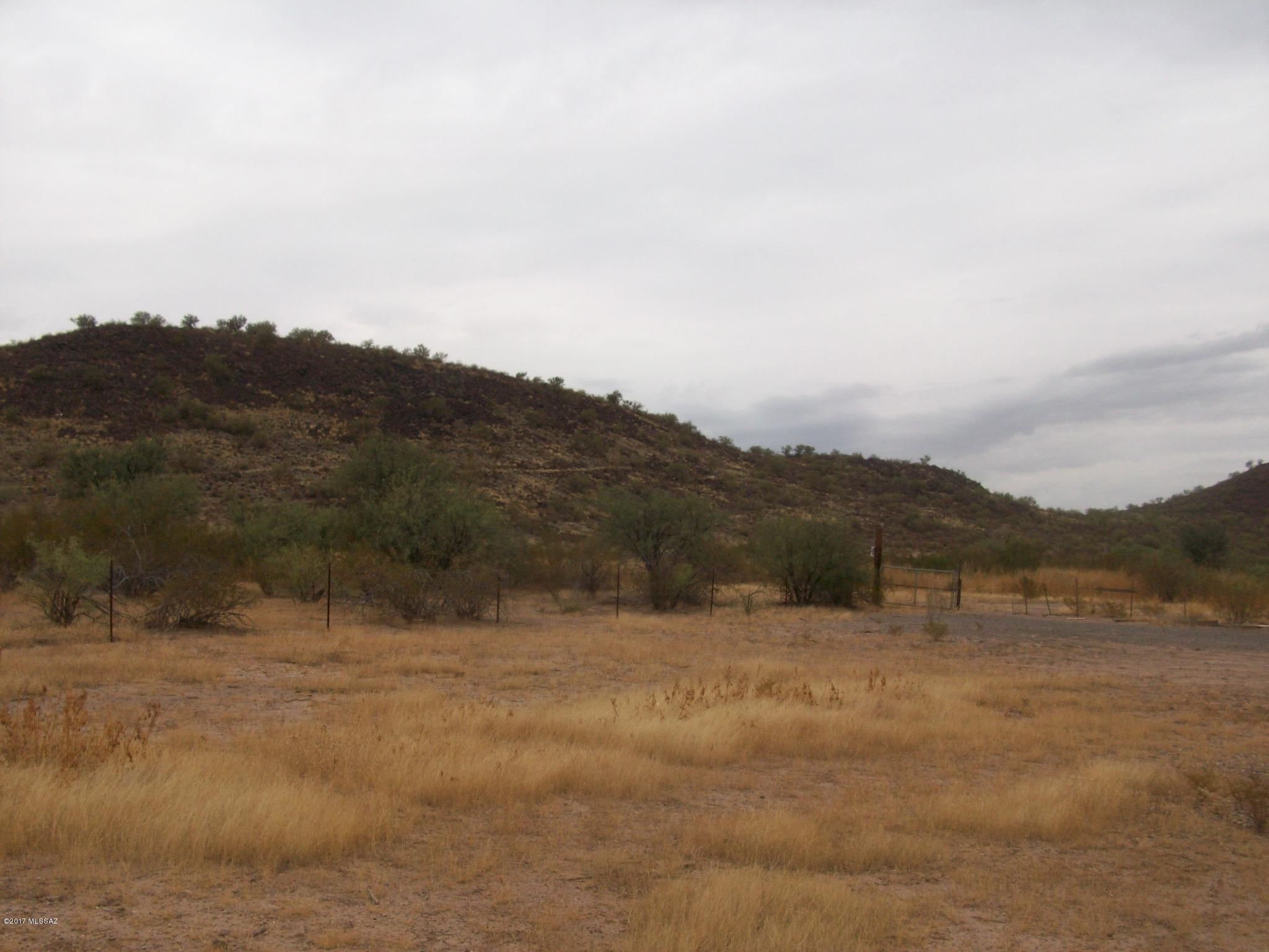 Five contiguous parcels - totalling 9.045 acres - some fencing, former dwellings mean possible septic (unfound) and well with no agreement - Physical access without recorded easements - great price for all this - buyer to verify information