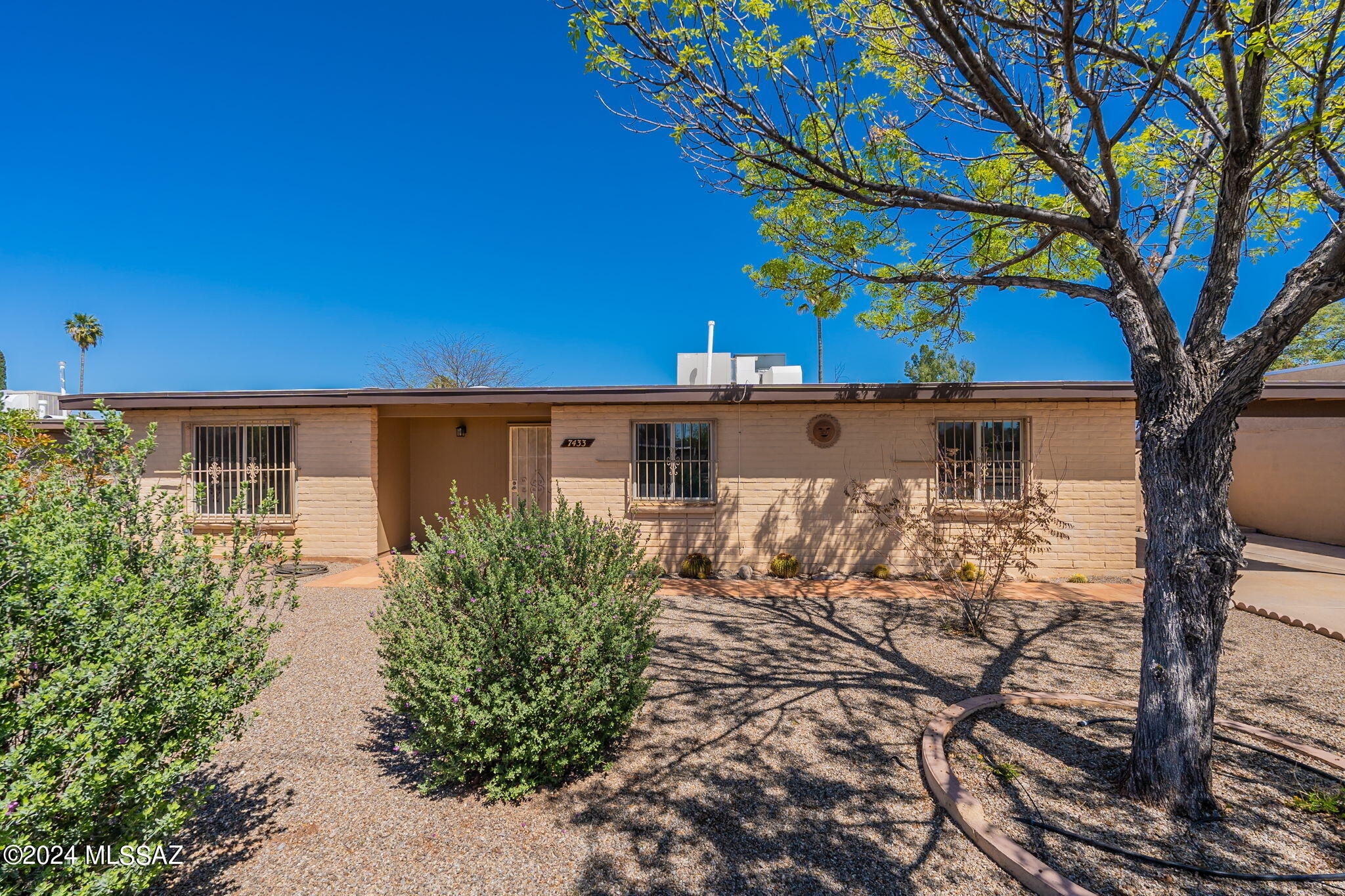 Newly remodeled home on almost a quarter acre lot with mountain views. Brand new custom kitchen cabinets with quartz countertops, new tile floors, new carpet, freshly painted interior. Recently replaced  HVAC and water heater. The large backyard has low maintenance landscaping and a shed to hold all your tools! Attached to the carport is a second storage area. The wood burning fire place will keep you cozy during the winter months and the north facing covered patio will keep you dry during the monsoon season. Come check it out before it's LONG gone!