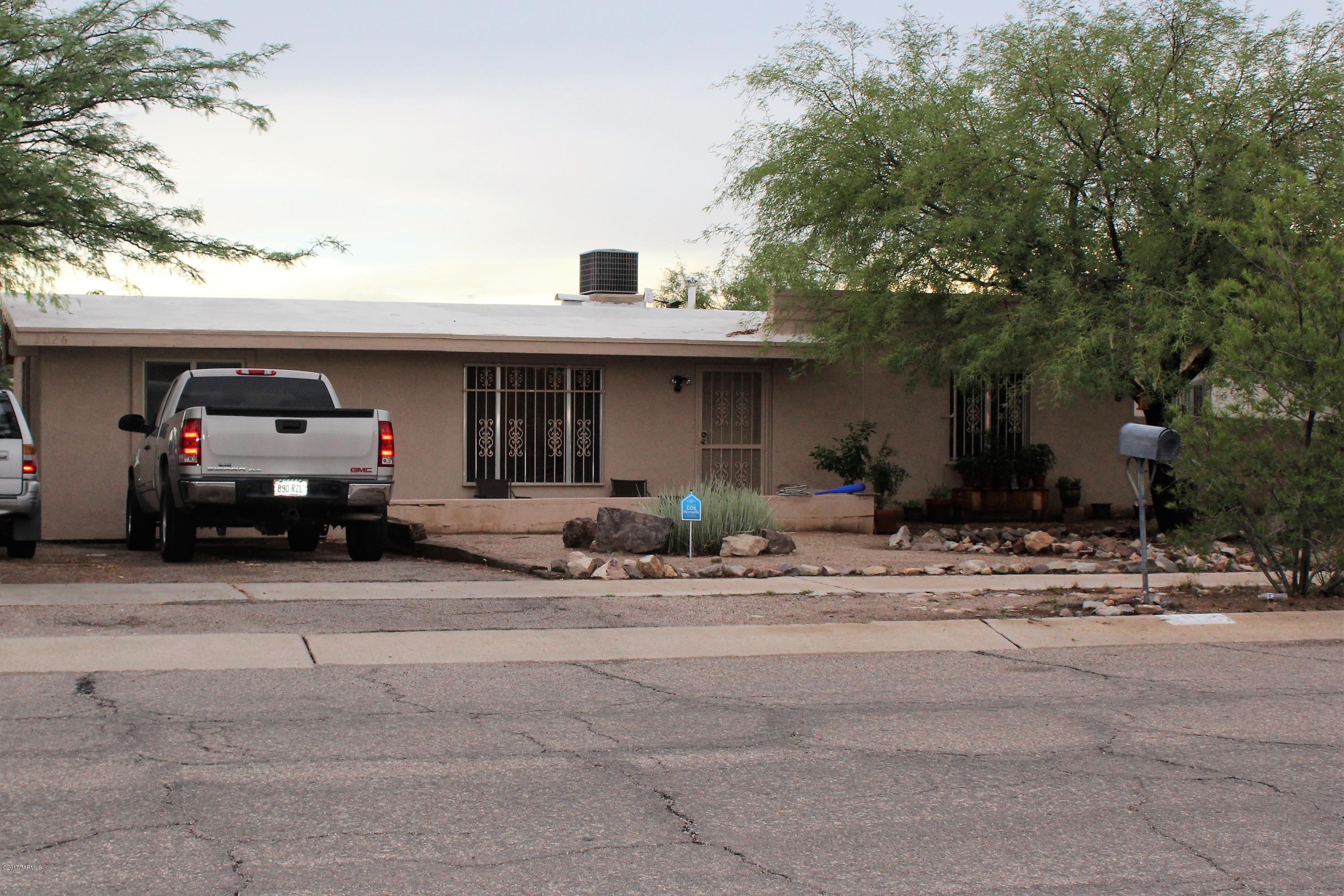 Property is sold as-is. Termite warranty included! Great investment opportunity!  Well built home on large lot is ideal as an investment opportunity  Enclosed carport is now a large bedroom. Ceramic tile throughout. A/C added in 2014.