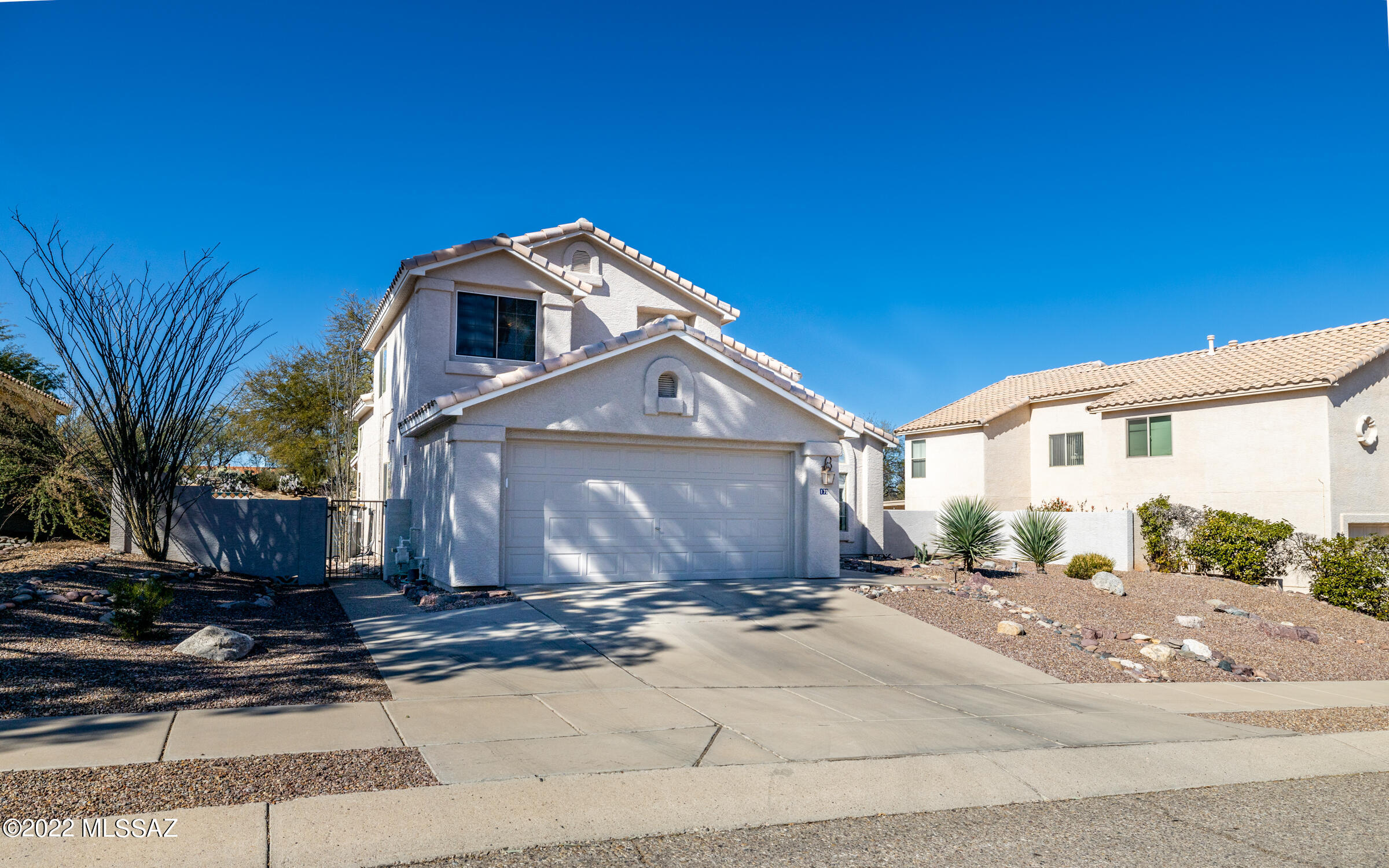 Just move right in to this Silverado hills home w Sweeping views from front and back. So many upgrades and updates. Its Like a new house: HVAC, Kitchen- dramatic Hickory Cabinets and Granite Countertops, Finished garage w built in cabinetry and Epoxy floor, Extended back porch across the entire back of the house, Recently purchased Washer & Dryer, Ext Paint 2020, Tile Roof replaced in 2020 has 20 yr warranty, Ceiling fans thruout, Stylish Security Doors front and back, Elegant wood staircase at entry w turned balusters. Balconette overlooks family room. Easy care plantings, Flagstone accent areas.  Back yard has plenty of room for grilling and chilling. Convenient to shopping, hospitals, groceries, movies, restaurants, Saguaro East and many biking and hiking trails.