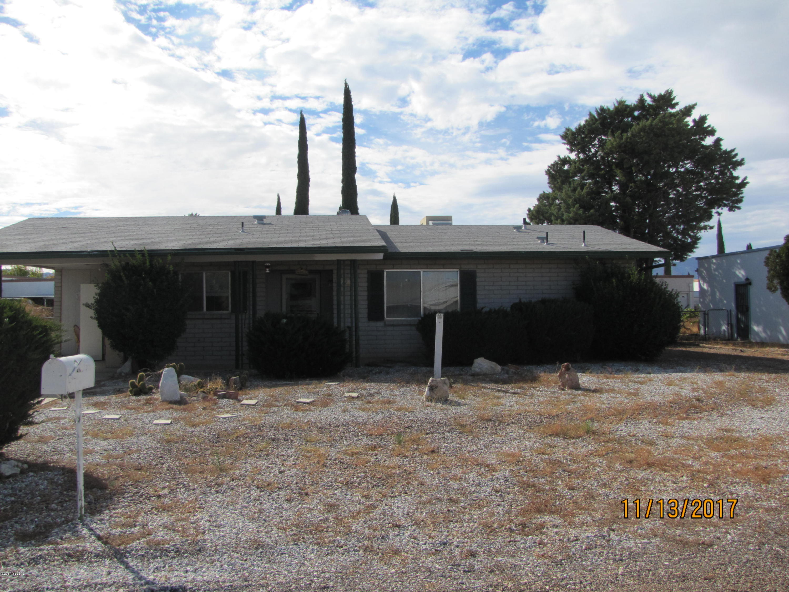 Nice 2BR/2Ba house, with room to west as possible 3rd BR or AZ room. Newer electric water heater. Fenced back yard, adjacent to alley with drive-thru gate, carport on south side of house, and shed in back yard. Just a few blocks to Hwy 191 and access to I-10. Property sold 'As-Is'.
