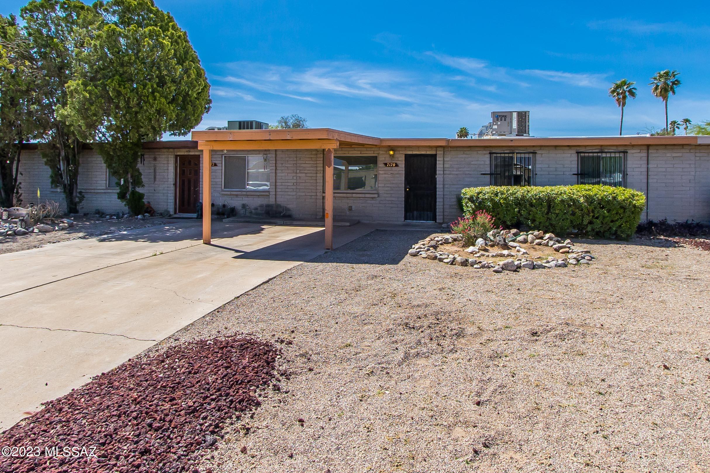 This middle unit townhome has NO HOA!  Lovingly cared for, the 3 bedroom / 2 bathroom home has a fantastic backyard with a storage shed.  Open kitchen, large living room with views of the Catalina's.  This home is not too big and not too small. It's just right!  Incredible established greenery in the backyard.  Close to Golf Links Sports Complex, Pima Air and Space, and the Air Force Base.  Not to mention restaurants and retail. Roof just cleaned and resealed, new sewer cutouts installed, HVAC recently serviced.