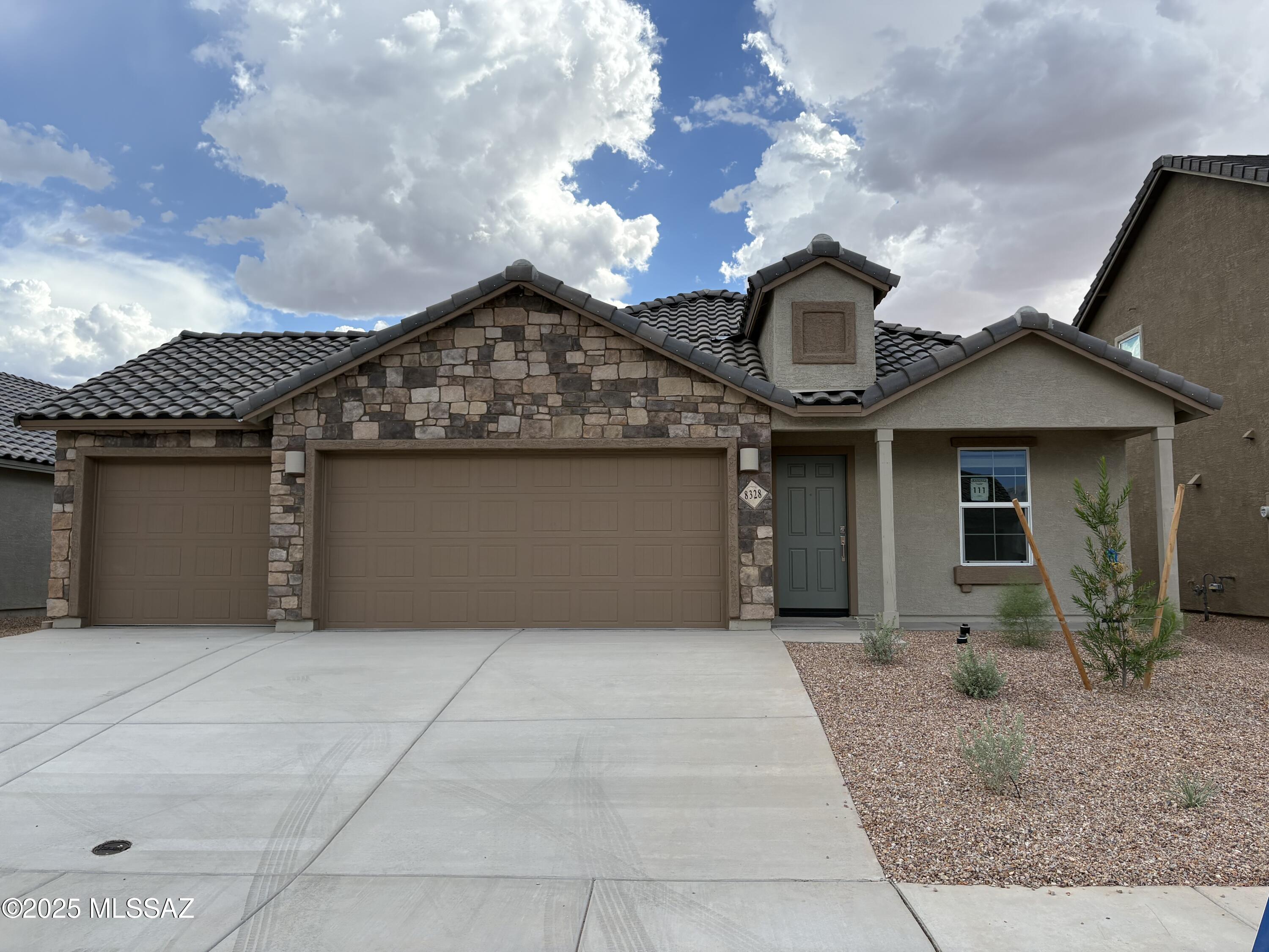 This new single-story home features a modern layout with room to grow. An inviting open-concept floorplan consisting of the kitchen, living and dining areas is surrounded by four spacious bedrooms. The restful owner's suite is tucked into a private rear corner, complete with an en-suite bathroom and walk-in closet. A three-bay garage completes the home. This home includes GE® stainless steal appliances, Rinnai Tankless Water Heater, prep for reverse osmosis, Granite Countertops, 2'' faux wood blinds, LED lighting and so much more!