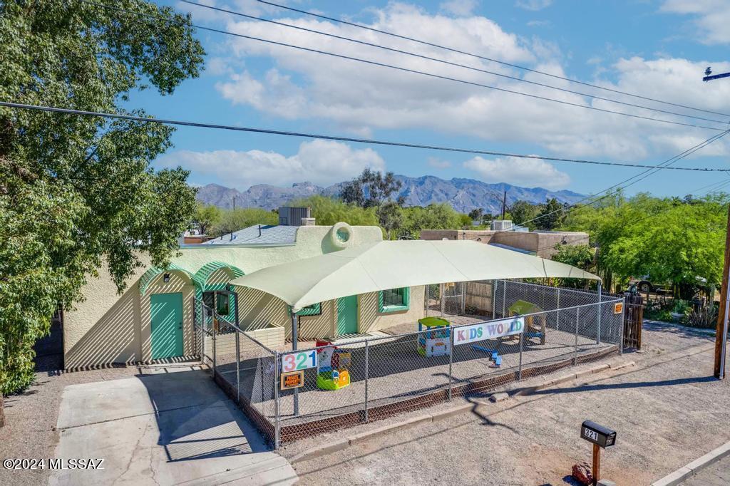 Pricing Improvement-Here is your opportunity to expand or open your Day Care or Preschool at this completely remodeled location in Tucson, near the Fort Lowell and Oracle area. This long term established 2587- sf, location is fully licensed for 59 students. Sale is to include all licenses and the existing corporation which holds the license. Contact the listing agent for additional information.  There is lots of playground are for the students to play.