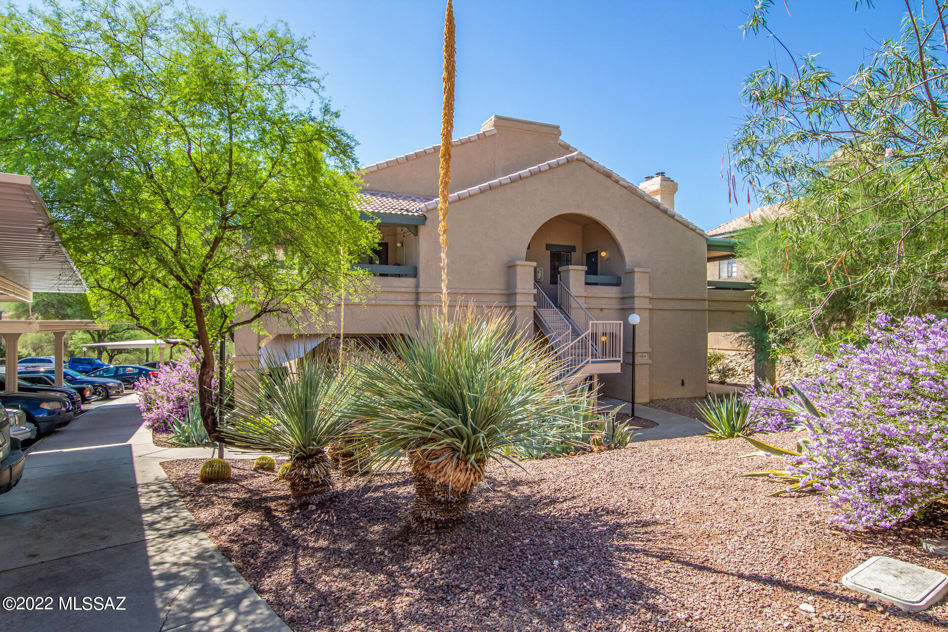 In Moonrise at Starr Pass, this well maintained condo located on bottom floor offers 2 bedrooms, 1, bath and 915 sq ft of living space. This home has a spacious living room, stainless steel kitchen appliances, wood burning fireplace, and washer and dryer. New carpet. Newly painted and wet areas upgraded to include  new sinks and microwave.  Community amenities include pool/spa, tennis court, fitness gym and clubhouse.