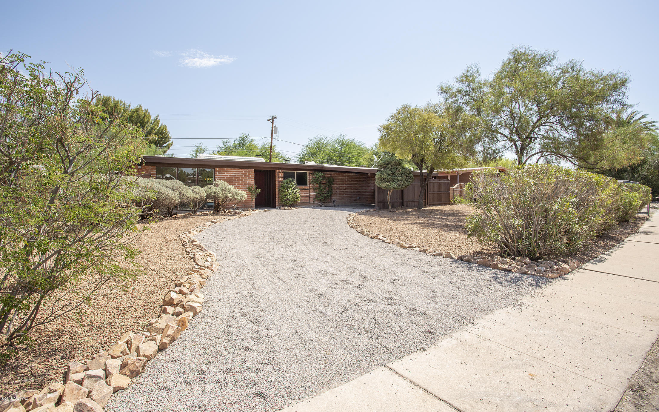 Very nice 3/2 bath Central home.  This remodeled open floor plan boasts new cabinets, new counters, new floor, new tile and new bathrooms.  Large walled in yard.  Close to everything. Owner/Agent
