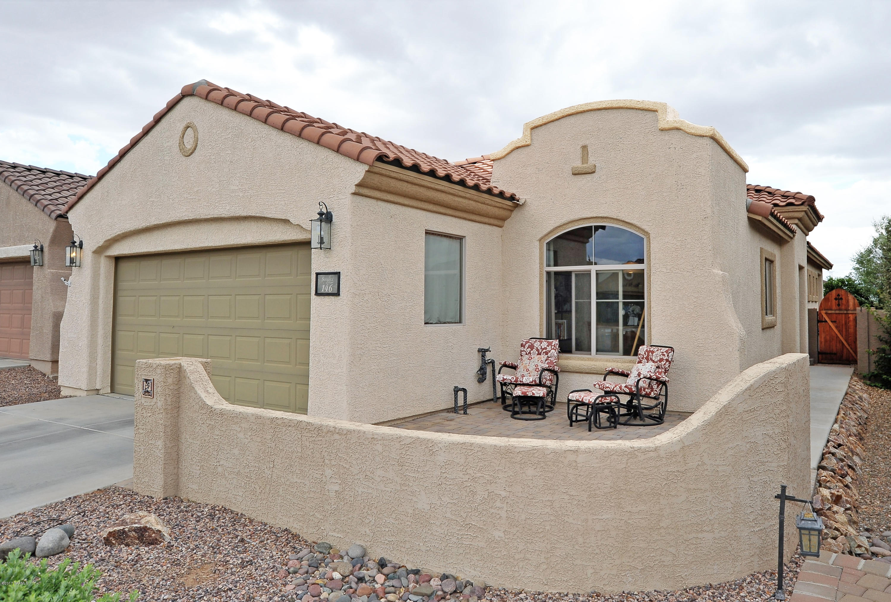 Gorgeous Home in 55+ Community with front courtyard & fully enclosed backyard w/ covered patio & higher block wall for added privacy. Updated kitchen features Corian countertops, decorative glass backsplash, matching stainless steel appliances & pantry. Cozy private breakfast nook off kitchen with large windows. Family room includes glass sliding doors leading to backyard. Home offers 18'' tile throughout with a split bedroom floor plan for added privacy. Master bedroom features bay windows overlooking into backyard & large walk in closet. Master bath offers double door, walk in shower w/sliding glass doors, double sinks & large wall mirrors w/vanity lighting. Laundry room with upper shelving. Community amenities include Rec center with kitchen, pool, spa, tennis court & exercise facility!