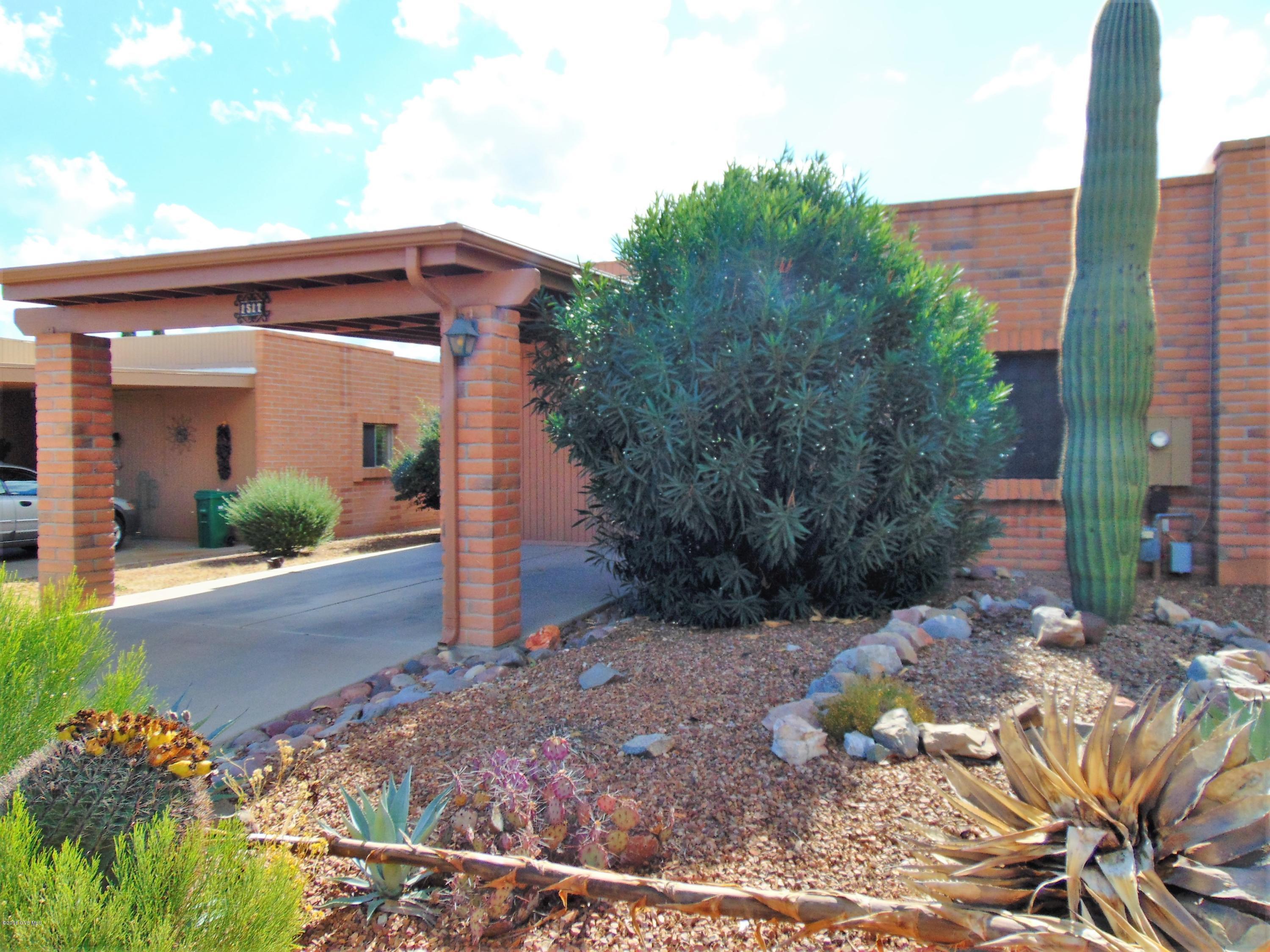 Cozy and freshly painted townhome on great Desert Hills 4. This end unit is well maintained & completely furnished including all kitchen utensils and lines. Large master bedroom & huge walk-in closet with a skylight. Use 2nd bedroom for guests or as an office,. Spacious living room looks out to covered bricked patio that backs to common area and has view of Santa Rita Mtns. A great place to enjoy that morning coffee!!. Laundry located in kitchen closet. Walk to the pool & GVR recreation center.
