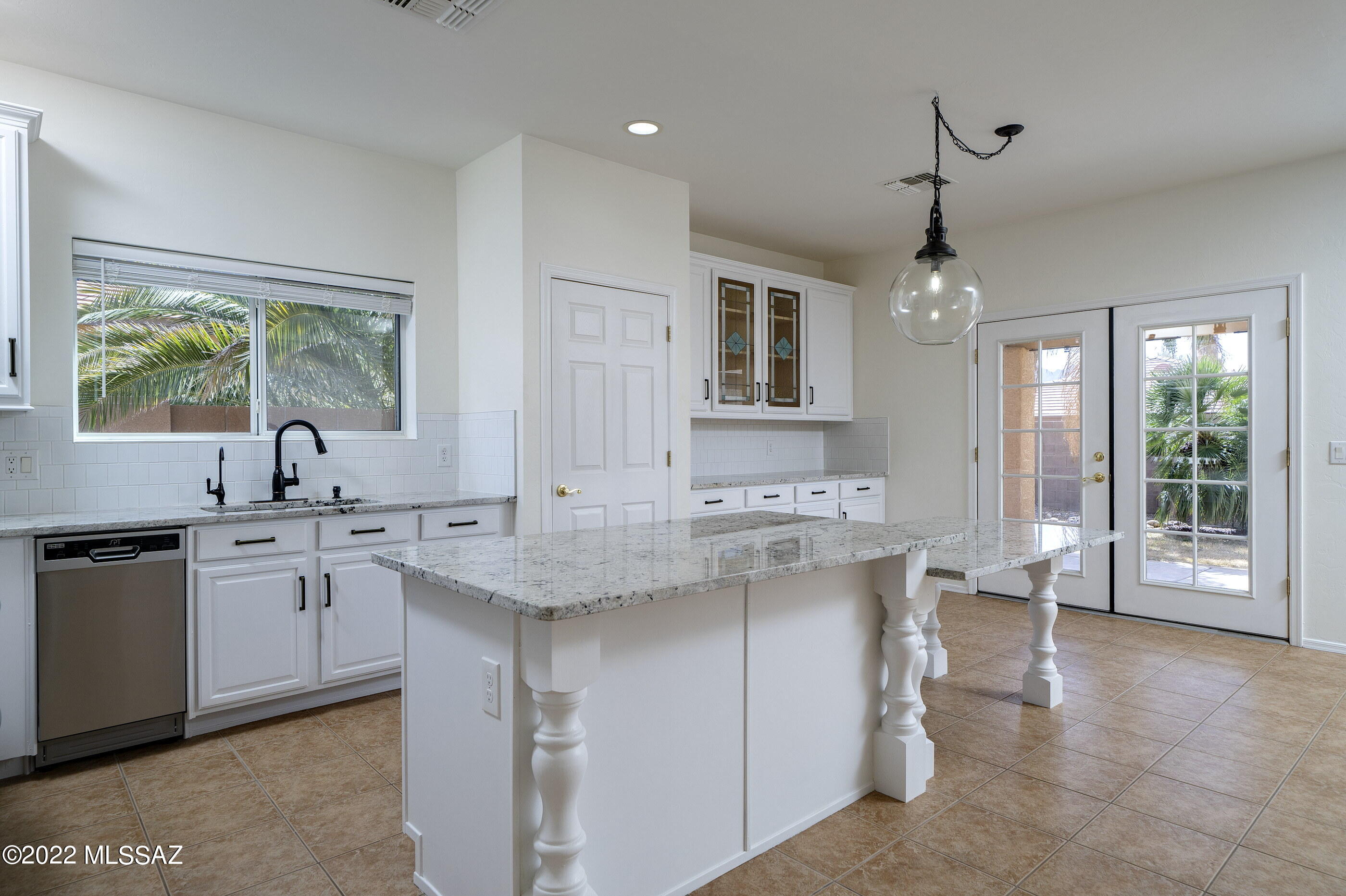 Move-in Ready and Shows like New!  Beautifully Updated in 2021, in Good Taste and Detail.  Soft Contemporary Design, all Neutral Palette.  Big Sunlit Rooms, High Ceilings, Skylight, Clean Lines, French Doors, New Granite Surfaces, and Wall-to-Wall Tile, all tied together in a Bright, Seamless Floor Plan.  No Interior Steps!  A Dream-Kitchen with Expansive Granite Island & Tabletop,  Subway Tile Backsplash, Stainless Steel Appliances, Buffet and Pantry.  Backyard Paradise with Majestic Mountain Views and Professionally Landscaped Yard with just the right touch of grass,.  Auto-Irrigation for Easy Care.  You'll love the Large Master Suite, Oversized Closets and Luxurious Spa-like Bathroom with Frameless Glass Shower & Marble Surround.  Tesla Solar (lease) completes your checklist. And there's more...2 Smart Thermostats for Separate Room Temperature Control, Water Softener System, New Reverse Osmosis Alkaline Water Filtration System and New Keyless Locks.  You'll love living here in Black Horse Ranch -- Close to Everything, yet Away from it All.