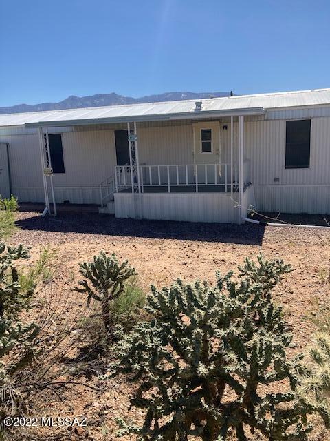 VIEWS< VIEWS< VIEWS...They are beautiful! This home is a Handyman's Hope needing some TLC. This nearly 1 flat acre lot is in a private, quiet area at the end of the roadway.   This home has large covered decks in both the front and back of the home. Split bedroom, great room design.  Newer HVAC, outdoor shed and lush natural desert round out this Diamond in the Rough.