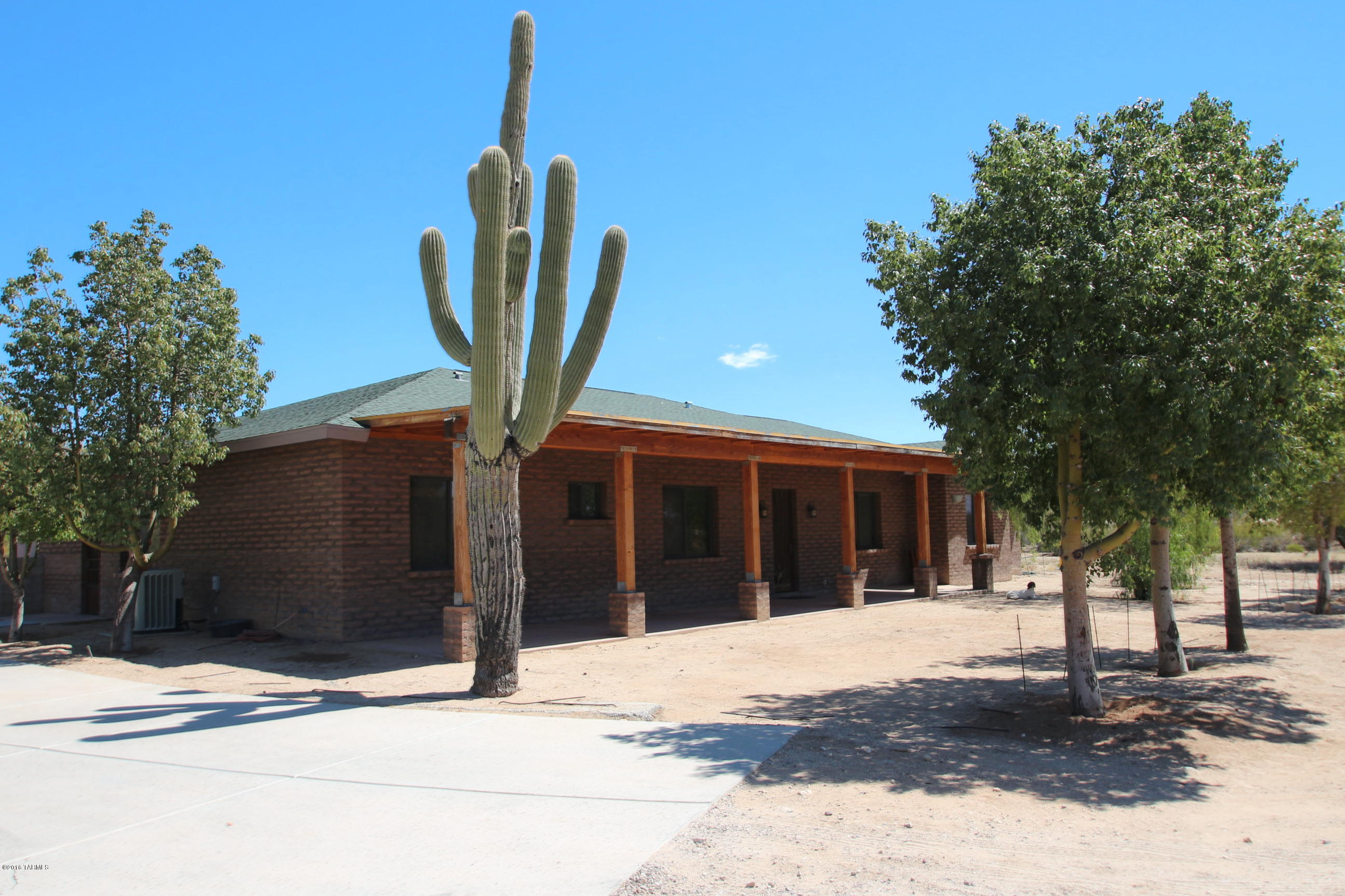 4000 Square Foot Masonry custom home builders personal residence built in the territorial style w/ masonry walls that echo the look of an old adobe homestead all set on 9.74 acres of privacy bordering acres of state lands. Including a 672SF guest casita that could be converted to a workshop or studio. An added bonus, the 40’X20’ metal building RV garage or workshop with electric and RV cleanout. The main house is designed with 6 bedrooms and a private den/study. 19X17 master suite with master bath & spa tub. Spacious open great room adjacent to the custom kitchen & formal dining area. Kitchen with top of the line stainless steel appliances, maple cabinets, granite breakfast bar, all lend an open airy feel for get togethers with friends & family. MLS21610603 & 21610604 child listings.