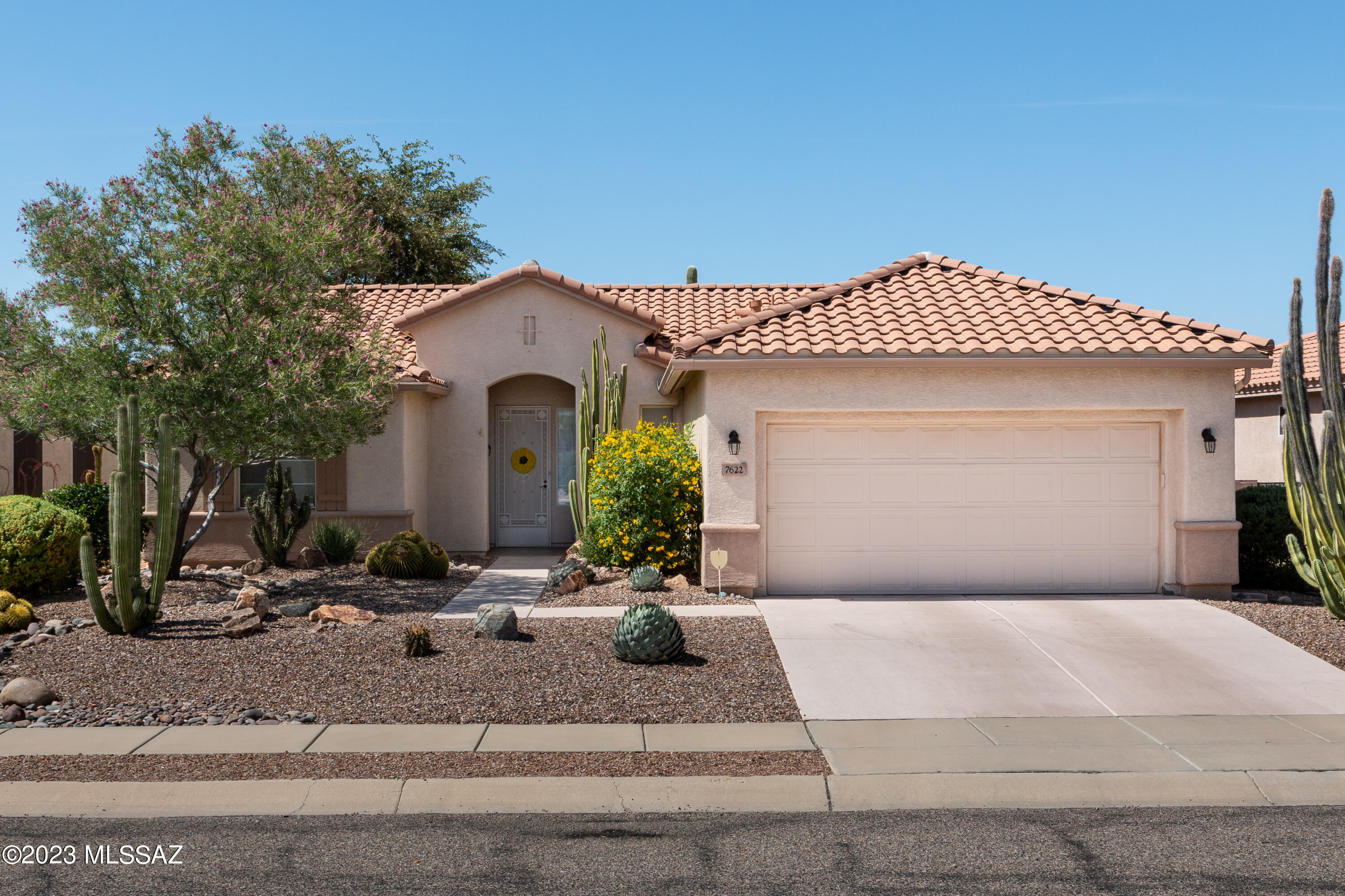 Built in 1999, this warm and inviting San Marcos floor plan features 2BR/2BA, den, hobby room, and 2-car garage. A beautifully landscaped entry invites you into this 1,648 sf home. The open concept living and dining is bright and airy. Anchored by warm granite counters, S/S appliances, custom cabinetry, and cozy breakfast nook, the kitchen includes plenty of prep space. The owners' suite is complete with dual vanities, step-in shower, and walk-in closet. A guest bedroom and bath are located in the front of the home. The den is conveniently located off the living area. The hobby room provides extra space for projects. A rear patio slider opens to an extended covered patio with a well-planned backyard. Upgrades include a newer roof, HVAC, and irrigation. Garage contains additional storage.