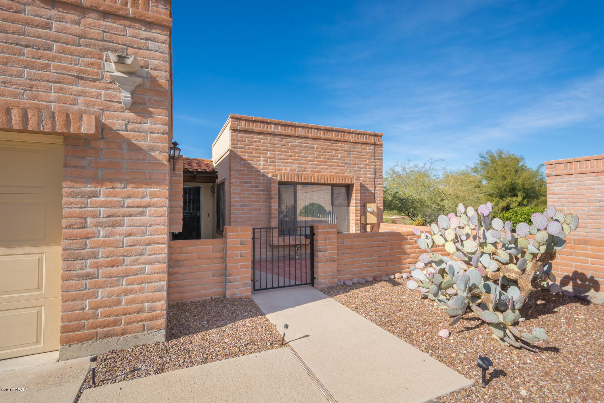 Don't miss this corner lot, stand alone townhome in Fairfield La Cholla Hills which is an active adult community (55+). This home has been recently upgraded with new paint, new flooring, & new appliances. Features include large living room with separate dining area, 2 spacious bedrooms, 2 baths, galley kitchen with lots of counter and cabinet space. 1 car garage with large storage room. Covered rear patio with sunset and mountain views. Plus great Catalina Mountain views from the front courtyard. Community amenities include 2 heated pools, 2 spas, 3 tennis courts, rec room and much more. Conveniently located near Foothills Mall and all services. New A/C & Furnace installed 2013.