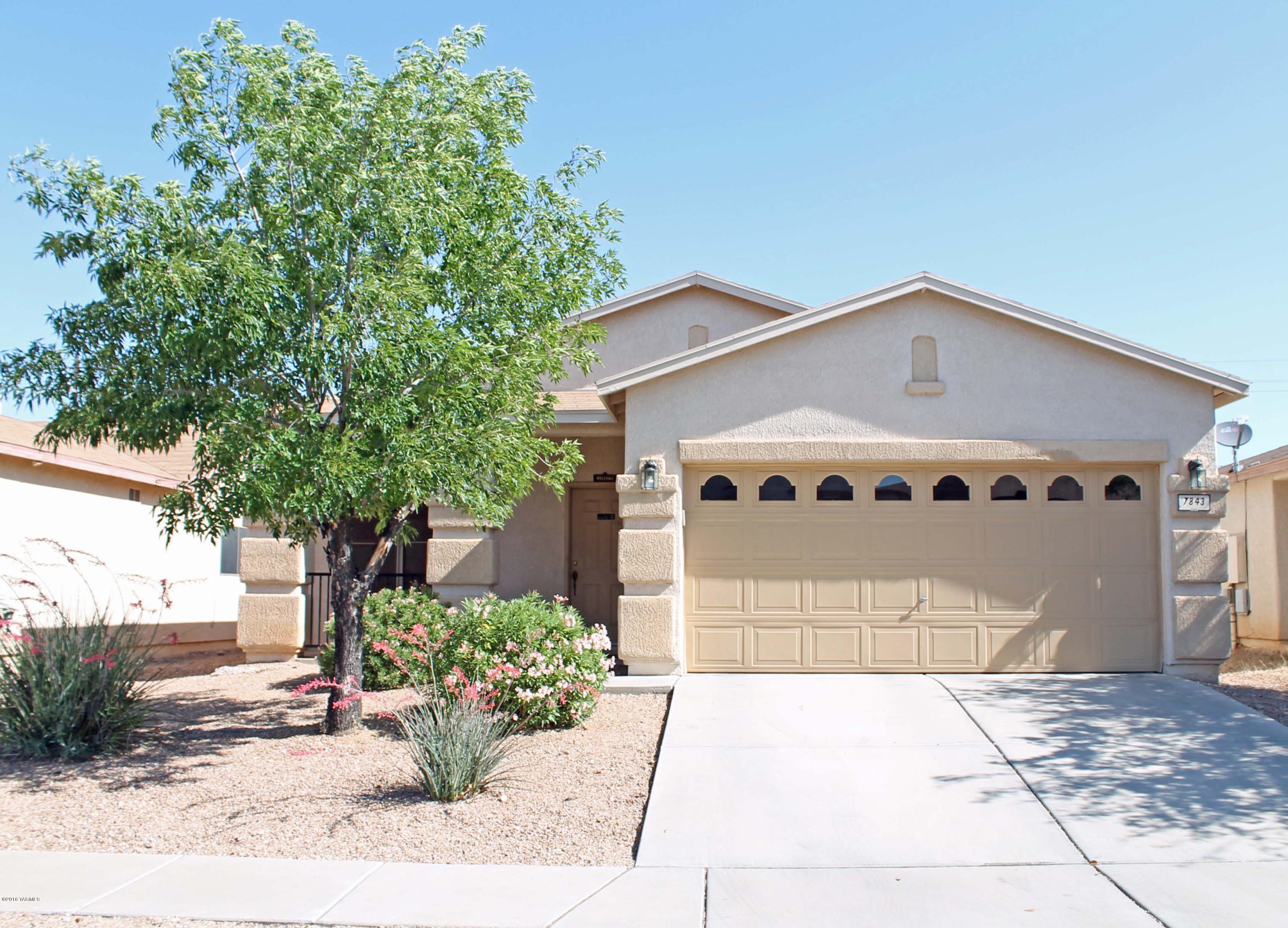 Seller will accept or counter offers within the price range of $150,000.00-$154,900.00. Great home in convenient location! 4 bedrooms and 2 baths make this the perfect family home. Bright and open with spacious vaulted ceilings, wood laminate flooring, built in bookcase, great backyard with block wall, water softener, 2 car garage, and so much more! This wonderful home located in Pantano Heights neighborhood is a must see! Close to shopping, schools and Davis-Monthan Air Force Base too. --Do not miss out on this spectacular deal!