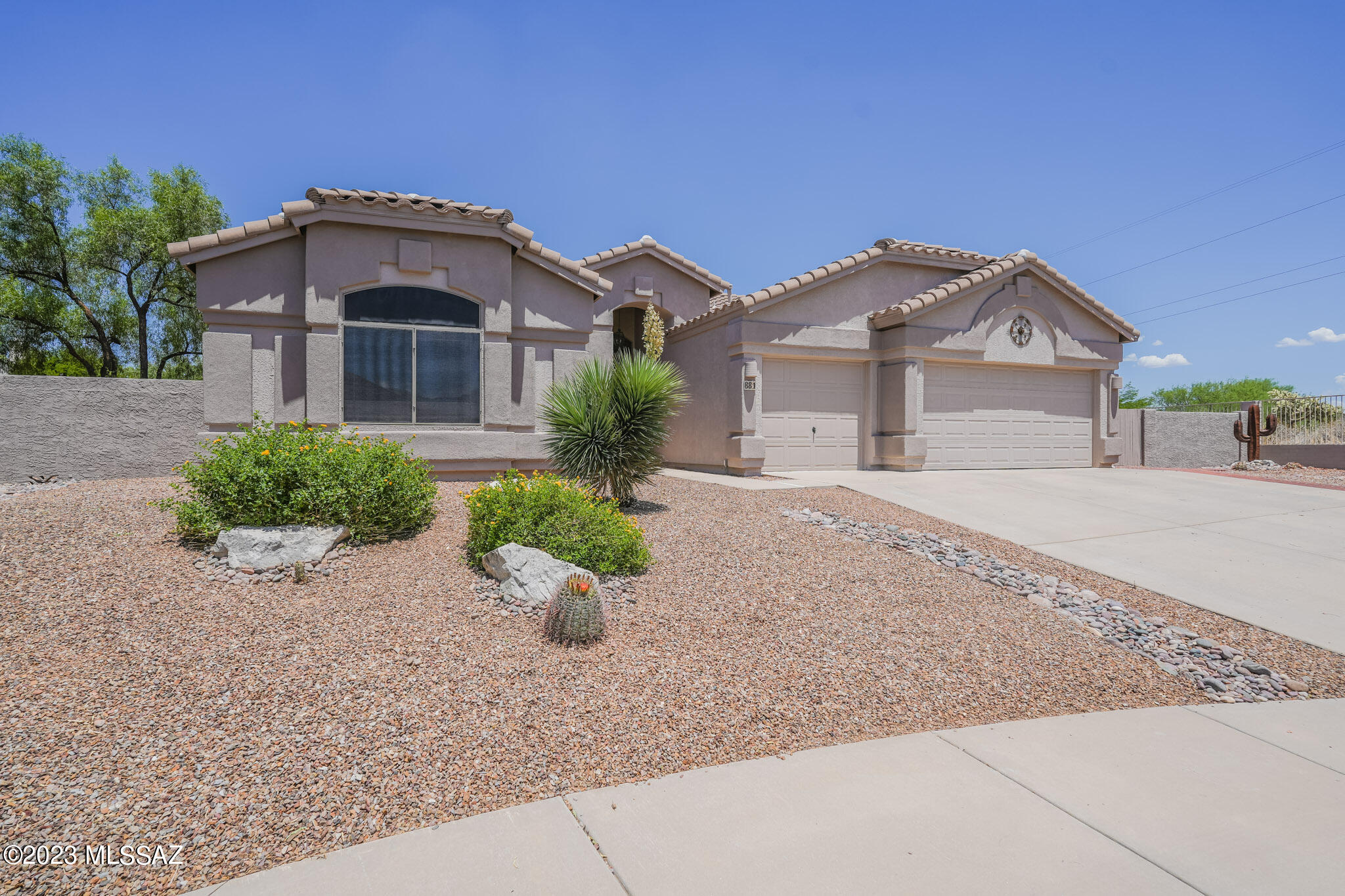 Remarkable home on an exceptional cul-de-sac lot with impressive mountain views; filled with charm and impeccably maintained. Step inside to find vaulted ceilings, gas fireplace, ceramic tile flooring laid on the diagonal, and warm paint tones throughout. Kitchen has convenient island, huge pantry, gorgeous granite counters and tile backsplash that perfectly complements the flooring and cabinetry. Other updates include spacious Primary Shower with tile surround, solar tubes, roof replaced in 2016, HVAC in 2014 and water heater in 2015. Three car garage has epoxy coating. Amazing backyard exemplifies outdoor living. Yard wraps around for stunning east-facing mountain views. Extended paver patio has path to versatile ramada. A must see!