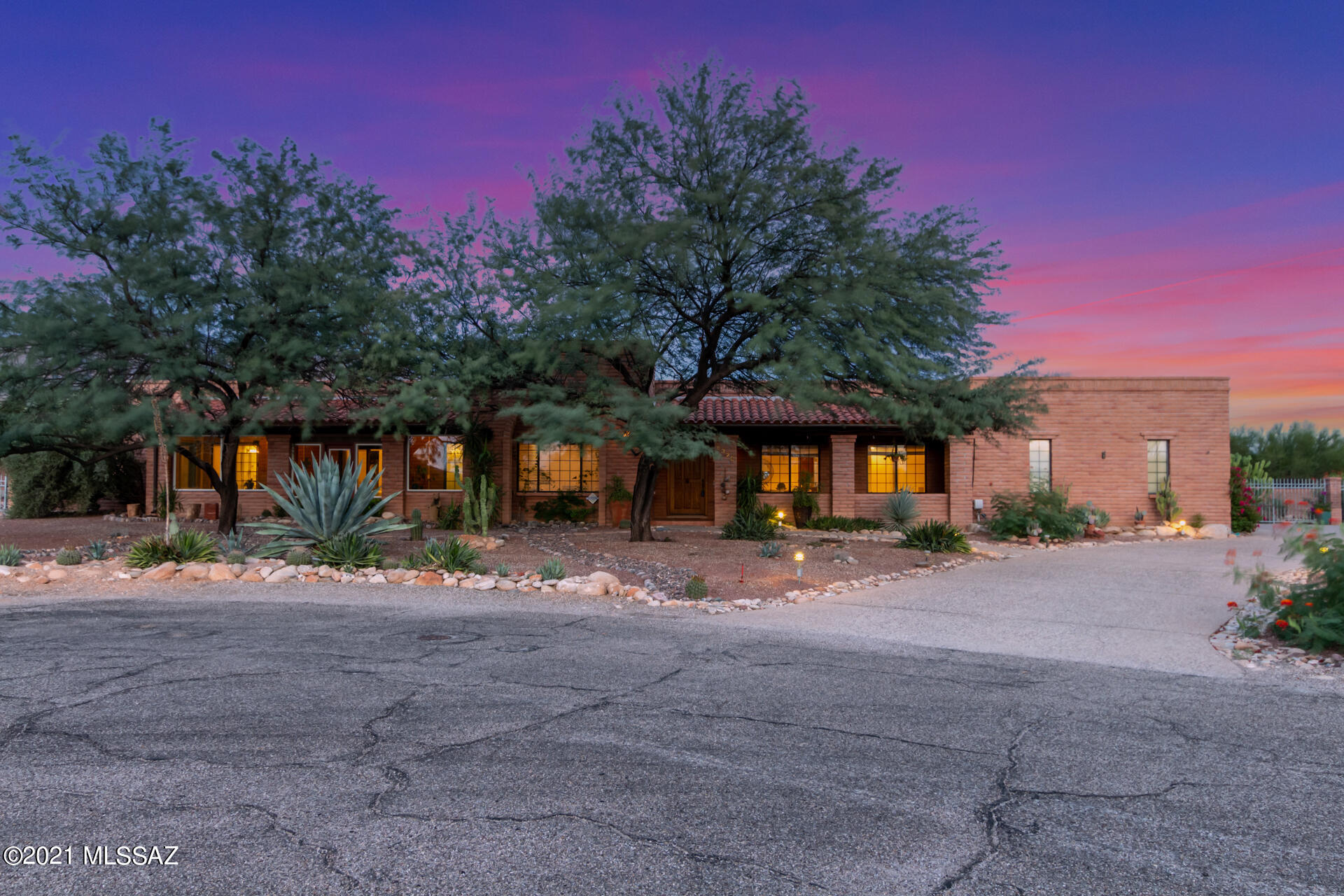 Gorgeous inside and out. Located in Tucson's premier Shadow Hills community. Enjoy
dramatic views of the Catalina mountains. This home features red brick architecture
from the exterior walls to interior archways. High and exposed beam ceilings. Large 3
car garage. Property provides space to park your RV. Central vacuum. Lush natural
vegetation and private backyard. Grow organic food in the garden or entertain guests at
the living room wet bar. This home has a lot to offer and is truly something special.
Roof serviced in 2017 and still under warranty.
Hvac replacement in 2017.
New mini-split ac installed in 2021 for bonus room.
