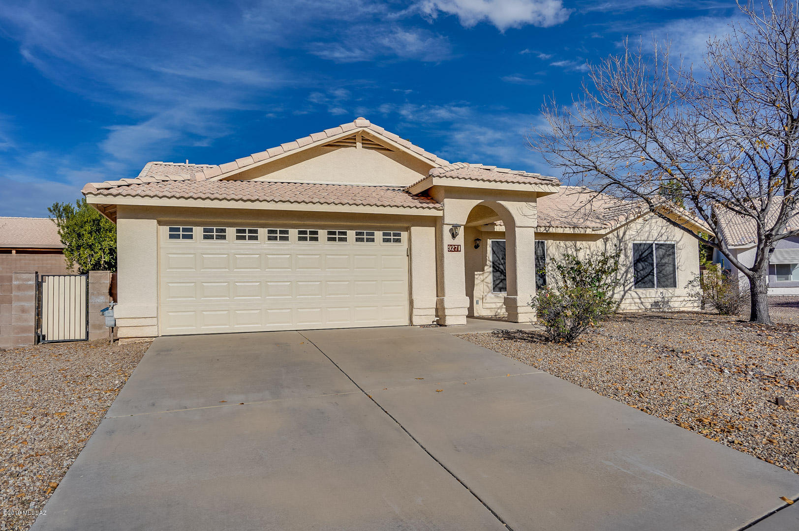 Great floor plan on a large, wide lot in Rita Ranch. NO HOA but the neighborhood shows pride of ownership. High vaulted ceilings make the rooms feel open and bright. The front room could be an office, rec/game room or formal living area. Beautiful updated granite top vanity in the master bedroom. Nicely landscaped rear yard with north facing covered patio and an additional ''gazebo'' area. The location provides great access to I-10, DM, the new Amazon building and much more. Major retail areas are minutes away including restaurants, grocery, Walmart and more. Hurry, this move in ready home will not last at this price.