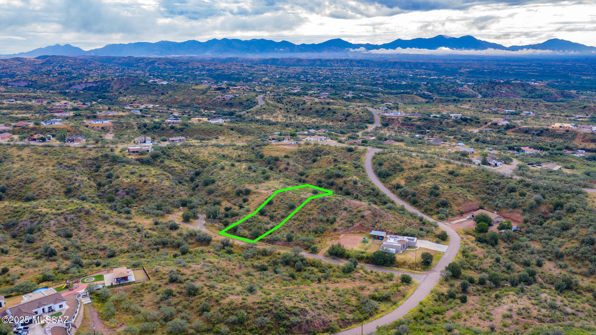 Property is .83 acres East of the I-19 off the Ruby Rd exit. This is vacant land in rural area of Rio Rico. Enjoy beautiful desert scenery. Quiet and serene, yet minutes from the freeway.