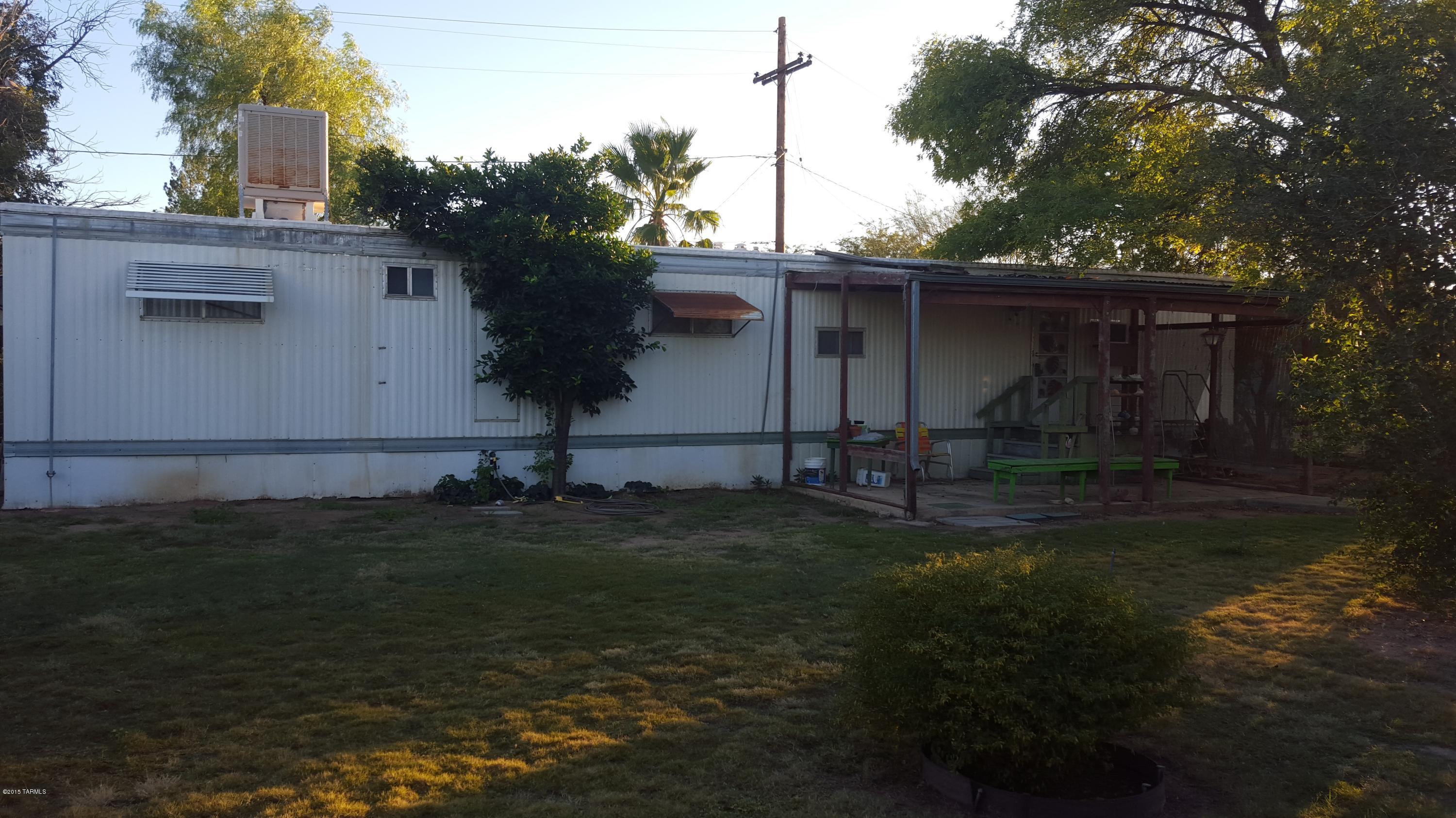 Sold AS IS with all contents, inside and out. Shed/work shop and Green House included. Lawnmower does not convey. Beautiful and mature landscaping and trees. Gorgeous lot. Completely fenced in.