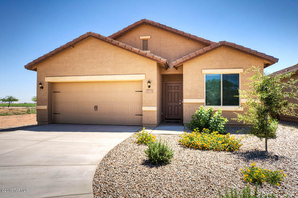 This beautiful new home comes with over $10,000 in upgrades including energy efficient kitchen appliances, spacious granite countertops, custom wood cabinets, brushed nickel hardware and an attached two car garage. The Bisbee floor plan also showcases a master suite complete with a walk-in closet, as well as a separate dining room, a fully fenced backyard, covered patio and front yard landscaping. The Sonoran Ranch community offers a plethora of amenities including miles of walking trails, as well as a park with a children’s playground and a spacious picnic area. The amenity-rich community and new, hassle-free home provide an extraordinary lifestyle for you and your family.