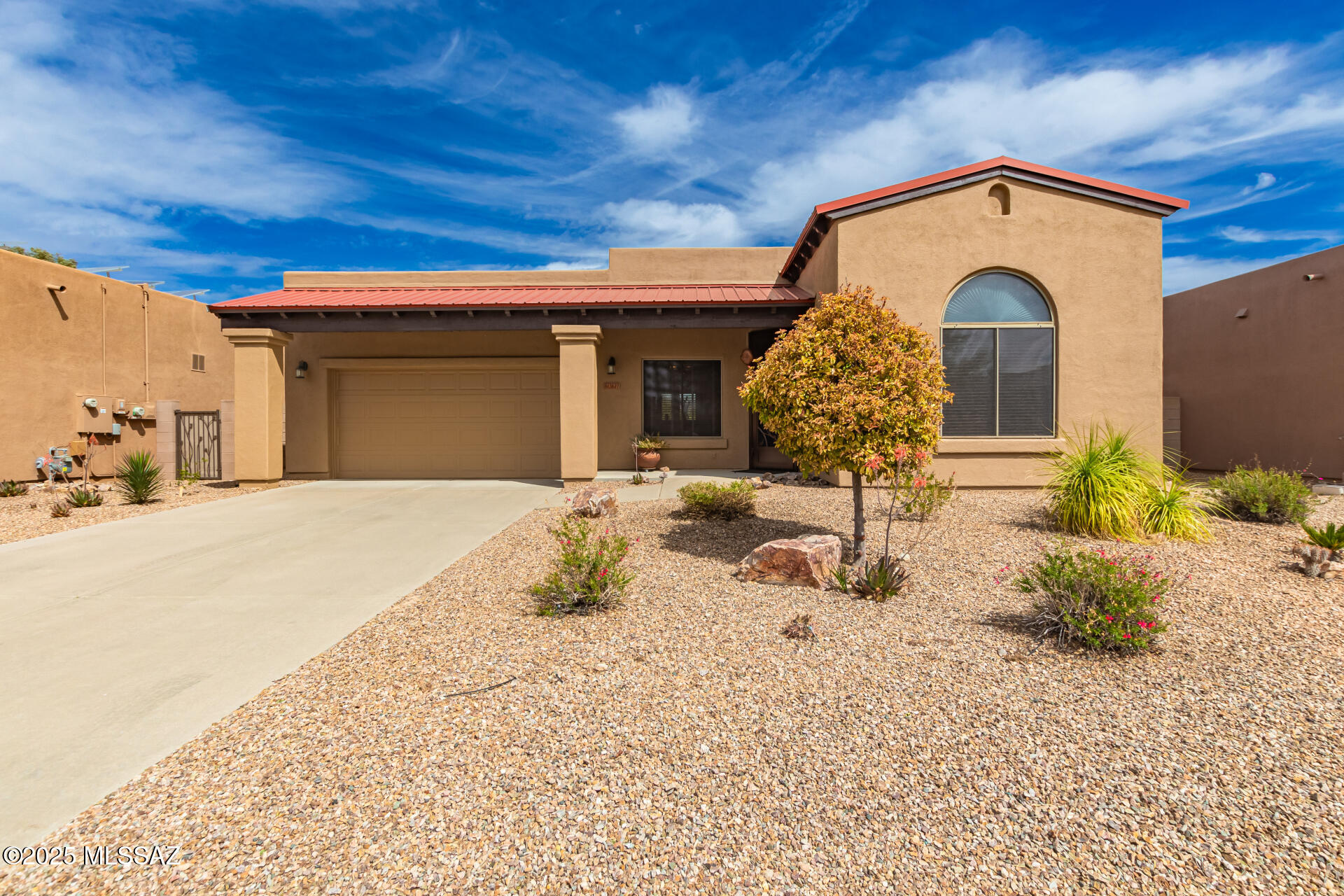 2270 sq ft, 3 bdrm, 2 bath home located in the desirable gated Wing View subdivision of Rancho Del Lago, backing to the 3rd fairway of the golf course & within walking distance to the local fishing lake. Split bdrm floor plan, w/ a family room, combined living/dining room & front office. Tile floor in main areas & new bedroom carpet. Vaulted ceilings, two new split HVAC systems, new water heater, new exterior paint, roof recoated 2024, water softener. Newer Pella exterior doors & custom wrought iron entry door. Pebble tec pool w/ water feature & newer Pentair quiet variable speed pool pump. Professionally landscaped backyard w/ brick paver pool decking, patios, low voltage lighting & new Orbit wi-fi irrigation controller. Amazing mountain views! Pride of Ownership!