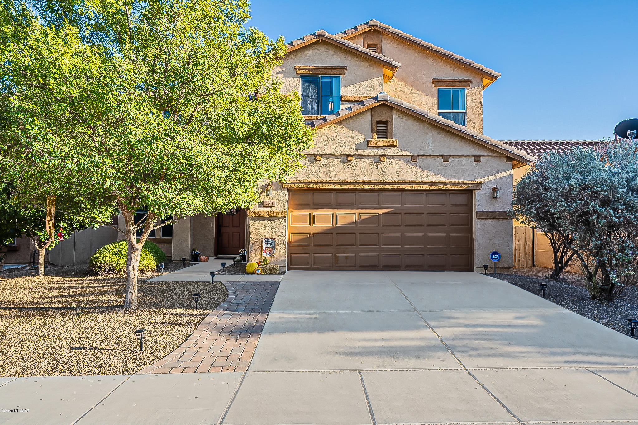A Must See! Spacious & Gorgeous perfect for entertaining. 4 BDR plus Loft, 3 BA home in desirable Rancho Sahuarita gated community of Entrada Bonita. Many extras- living spaces downstairs include formal rooms, great room concept, breakfast nook, powder room & storage closet. Gourmet kitchen has beautiful granite countertops, sink island, built-in double ovens, gas stove top w/ microwave & lg walk-in pantry. Upstairs features 4 bedrooms plus loft w/ balcony overlooking backyard, private, no neighbors behind home. walk-in closets. Guest bath has door separating tub/toilet from dual sink vanity. Master Bath has soak tub & separate shower plus dual sink executive height vanity. Backyard has built-in BBQ, firepit, X-large covered patio. 3 car tandem garage. Come enjoy the community amenities