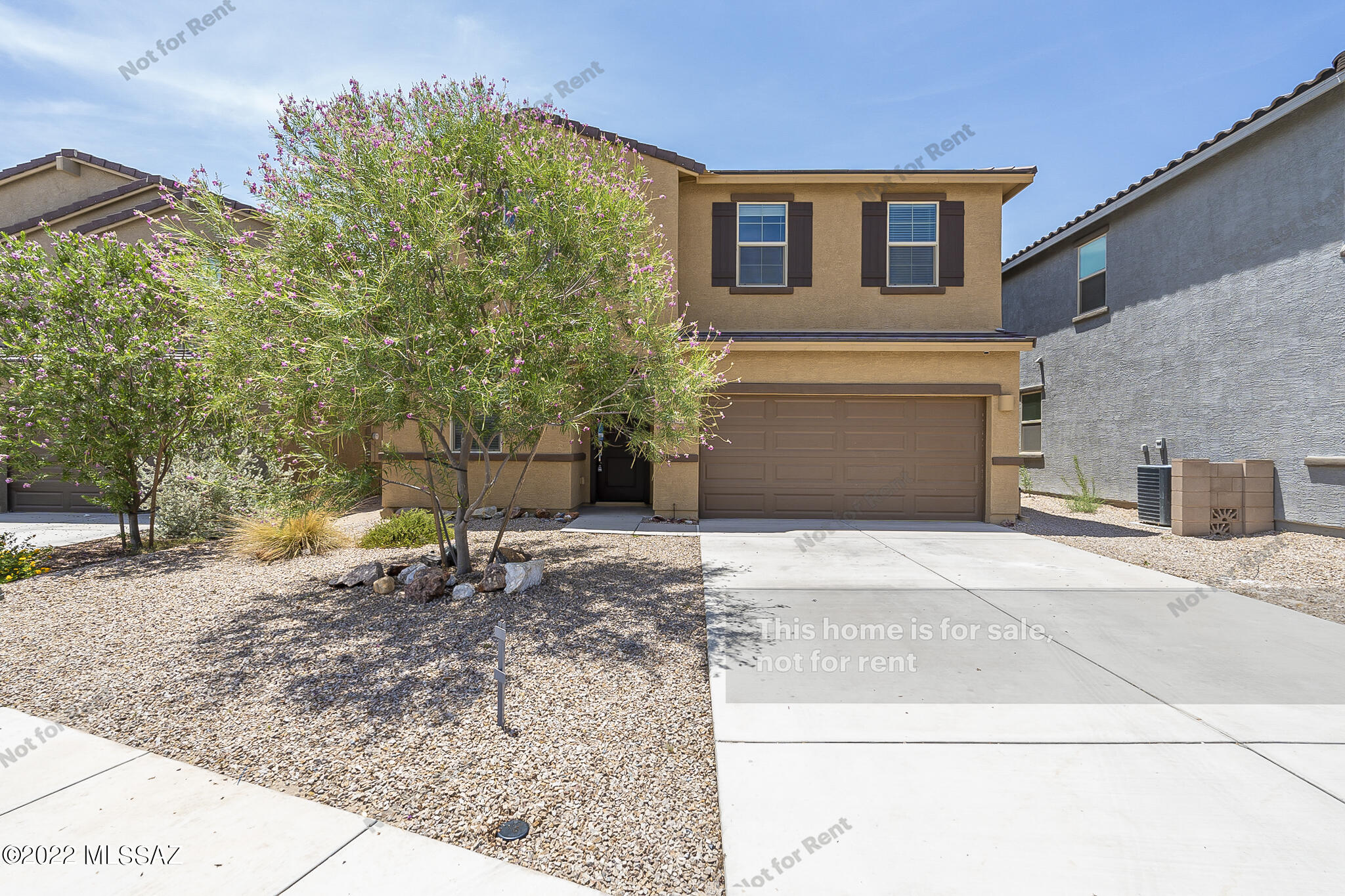 Don't miss this 4 bedroom 2.5 bathroom Marana home, built in 2019! The kitchen is fully equipped with stainless steel appliances, a center island, and a walk in pantry. Beautiful light fixtures and fans flow throughout the home. The master bedroom is complete with a spacious en suite bathroom and walk in closet attached. Relax on the patio area in the fenced in backyard, built with low maintenance desert materials. Come see this home today!