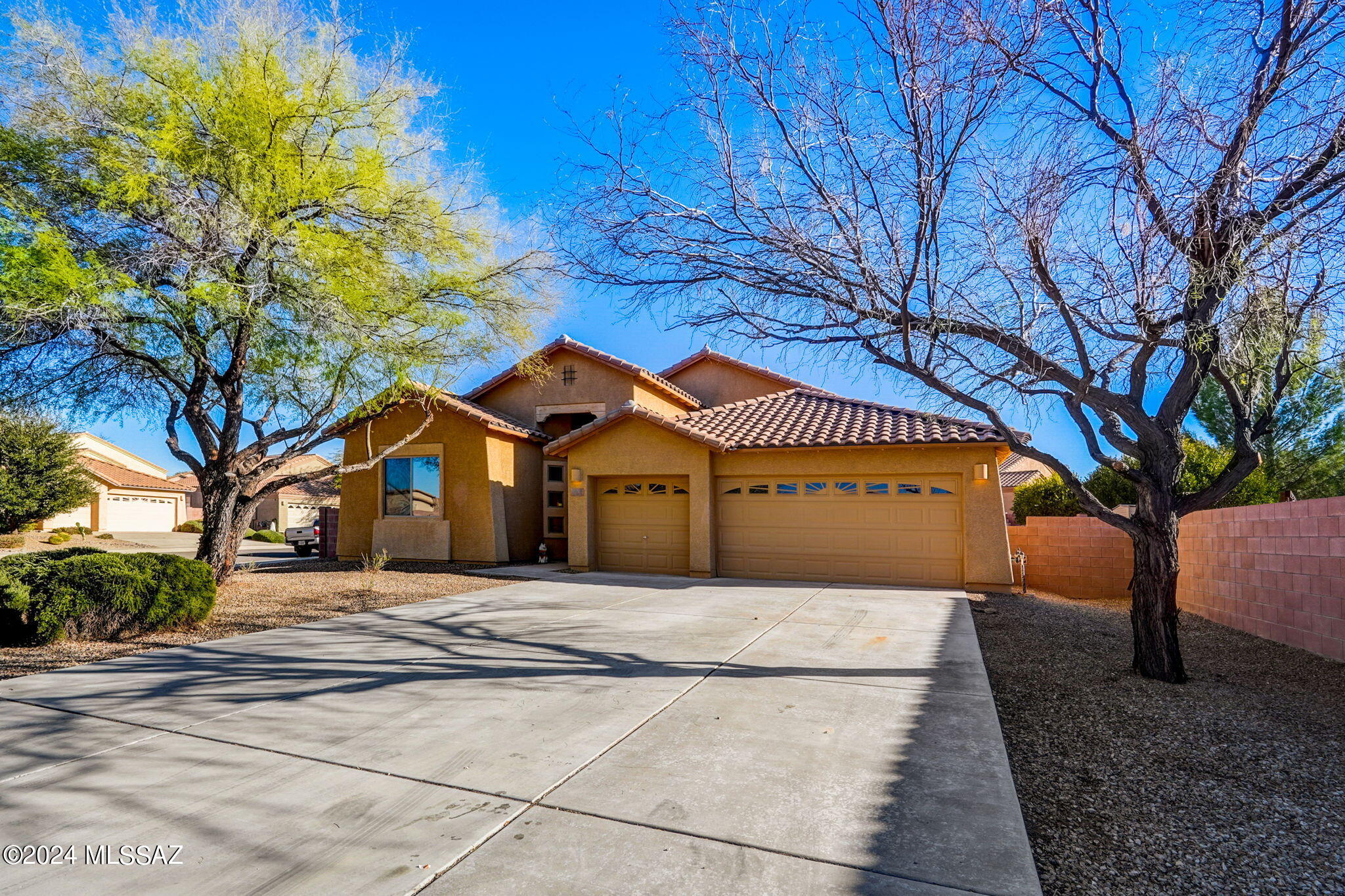 **Welcome to Your Dream Home: A Stunning Renovation in Sahuarita, AZ**

Discover the epitome of suburban living at 309 N Oak Tree Canyon Loop, a breathtaking residence nestled in the heart of Sahuarita, AZ. Recently renovated to perfection, this home boasts an expansive 2,338 square feet of living space, thoughtfully designed to cater to the modern family's needs and desires.

With 4 generously sized bedrooms and 2 elegantly appointed bathrooms, this home offers ample space for relaxation and privacy.
Step inside to find a seamless blend of comfort and style, with an open floor plan that invites you to unwind and entertain. The living area transitions smoothly into the dining space and a bright, cozy kitchen where you'll find stainless steel appliances, quartz countertops, and timeless cabinetry.
The oversized lot provides a blank canvas for your outdoor dreams. The huge driveway leads to a private backyard, perfect for gatherings, gardening, or simply enjoying the Arizona sunsets. Whether you envision a pool, a lush garden, or an outdoor kitchen, there's ample space to bring your vision to life.
Situated in a serene loop in Sahuarita, you'll enjoy the tranquility of suburban life while being just a stone's throw away from local amenities, parks, and schools. Easy access to major highways also ensures that you're never too far from the vibrant city life of Tucson.  Agents are principals of JGTAZ, LLC- Both members of LLC are licensed real estate agents.