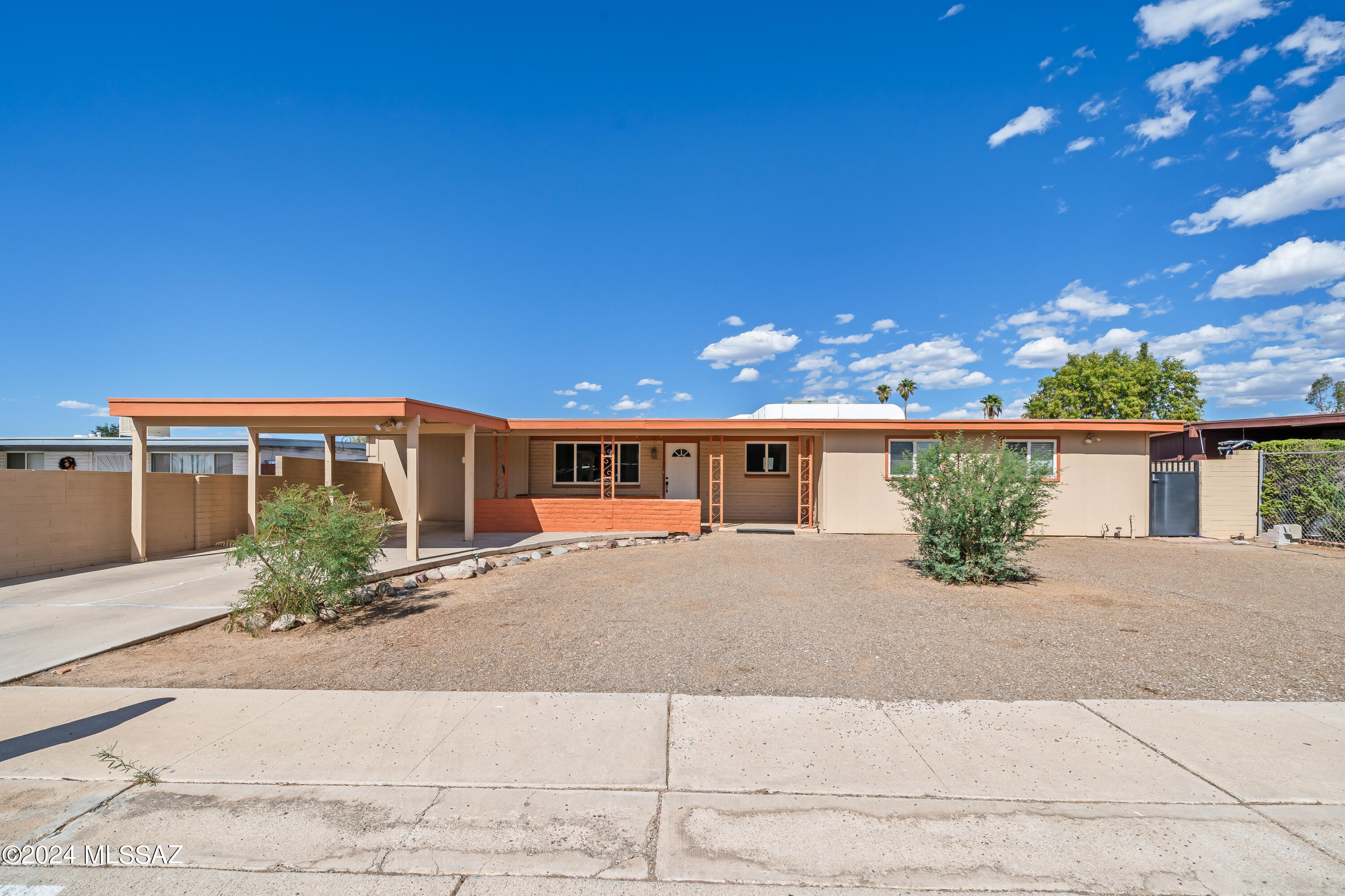 Priced to sell!  Walk into instant equity with this stunning 4 bed, 2 bath updated home located on Tucson's desirable east side. This bright and cheery home features a custom kitchen with granite countertops, floating shelves and stainless-steel appliances, perfect for both everyday meals and entertaining. The versatile flex room offers endless possibilities, whether you envision it as a home office, workshop, gym, or even a 5th bedroom, it could be whatever your heart desires. Step outside to a spacious backyard and take a dip in the sparkling pool on a hot summer day while enjoying the mountain views. Inside, cozy up by the charming fireplace, adding warmth and comfort to this already inviting home. Don't miss the opportunity to make this your dream home! Close to DMAFB and no HOA!