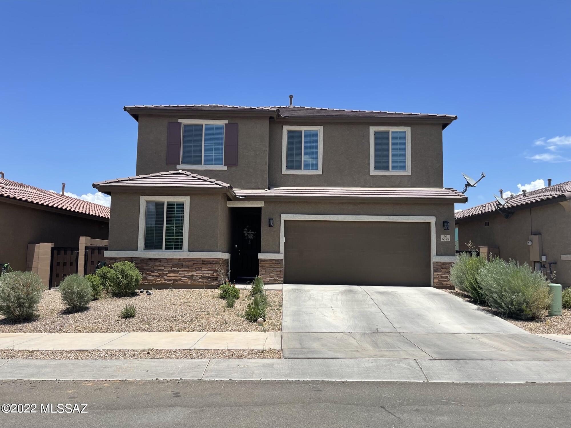 Wow! This immaculate home is what you've been looking for! Conveniently located off Wilmot and I-10, close to DM, Raytheon, Amazon, and in the Vail School District, this 2367 sq. ft. 4bed/2.5 bath has it all! Light and airy open floor plan has great room with upgraded kitchen with large island, Stainless Steel appliances with smart fridge, gas stove, pantry, and plenty of cabinet and counter space. Downstairs features bedroom and half bath. Upstairs has spacious loft with wonderful natural lighting. Large primary bedroom includes bathroom with dual vanities and walk-in shower complete with huge walk-in closet. 2nd and 3rd bedrooms are extra roomy. Laundry room with w/d included. Bonus room off laundry. Block fence back yard with covered patio. Community with pool, and parks.