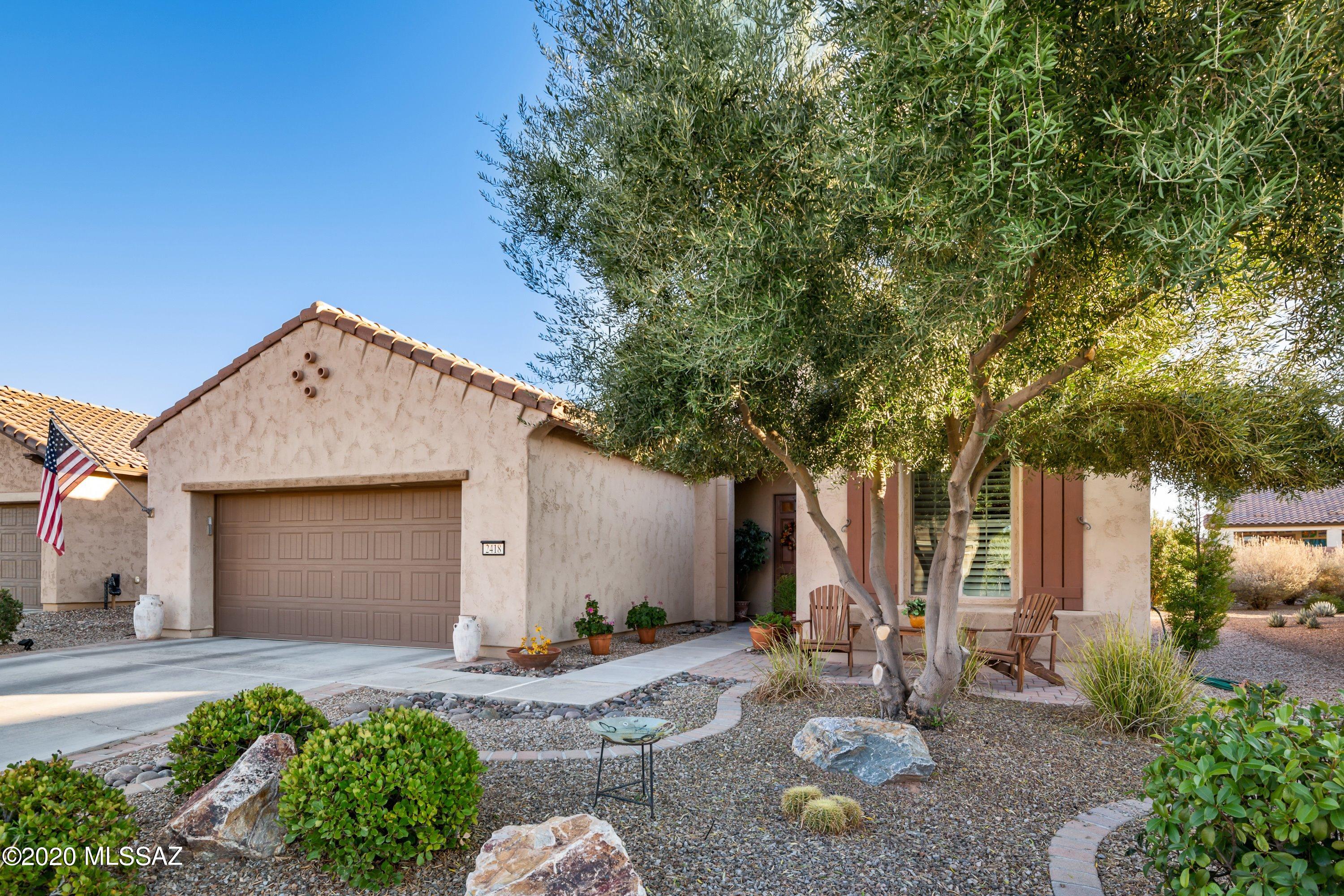 Beautifully upgraded Fiesta model in gated Quail Creek! Gorgeous 2 bed, den, 2.5 bath home w/bright & open floor plan. Great room opens to gourmet kitchen & dining, perfect for entertaining. Cook's delight, SS upgraded appliances, designer tile backsplash, cherry cabinets w/crown molding & pendant lights over large island. Landscaped backyard w/paver patio for year round outdoor living. Luxurious master suite w/new carpet & bay window is a perfect retreat, master bath has linen closet, dual sinks & huge walk in closet. 2nd bed is a guest suite. Huge laundry room offers plenty of space for office, currently being used as an office. Upgrades include: ceiling fans, lighting, tile in living areas, front patio & workbench in garage w/SS cabinets above WB. Resort style living! Floor plan in docs