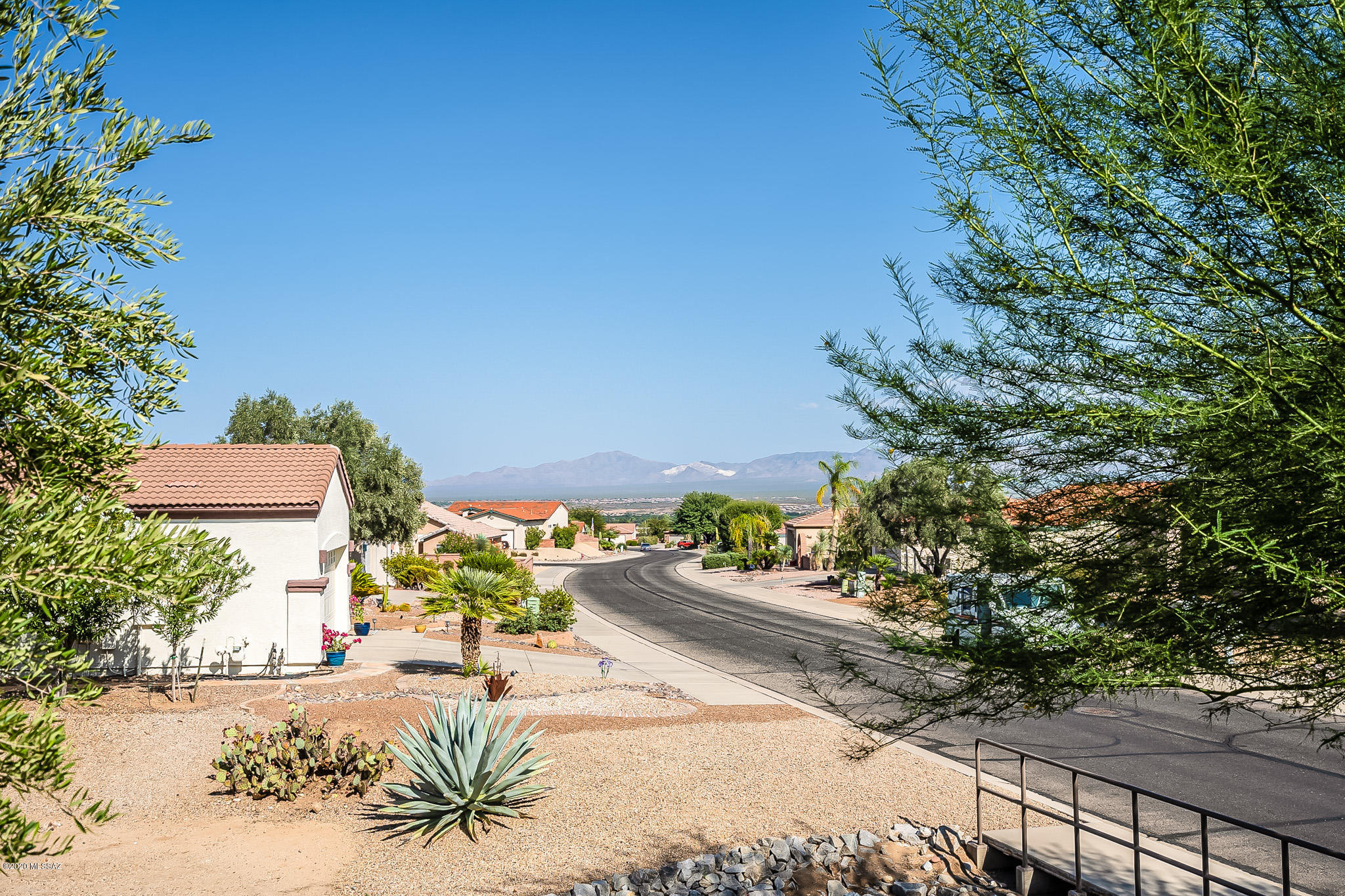 Great mountain views from the side enclosed patio and backyard. The corner lot offers privacy bordered by common area. Great room floorplan has built-ins and gas fireplace. The kitchen has granite counter tops and newer dishwasher & refrigerator. Main house has large master suite, guest bedroom plus den. The casita has a bedroom plus bath. The garage has been extended and has built-in cabinets. Priced so you can put your personal touches on flooring and walls.