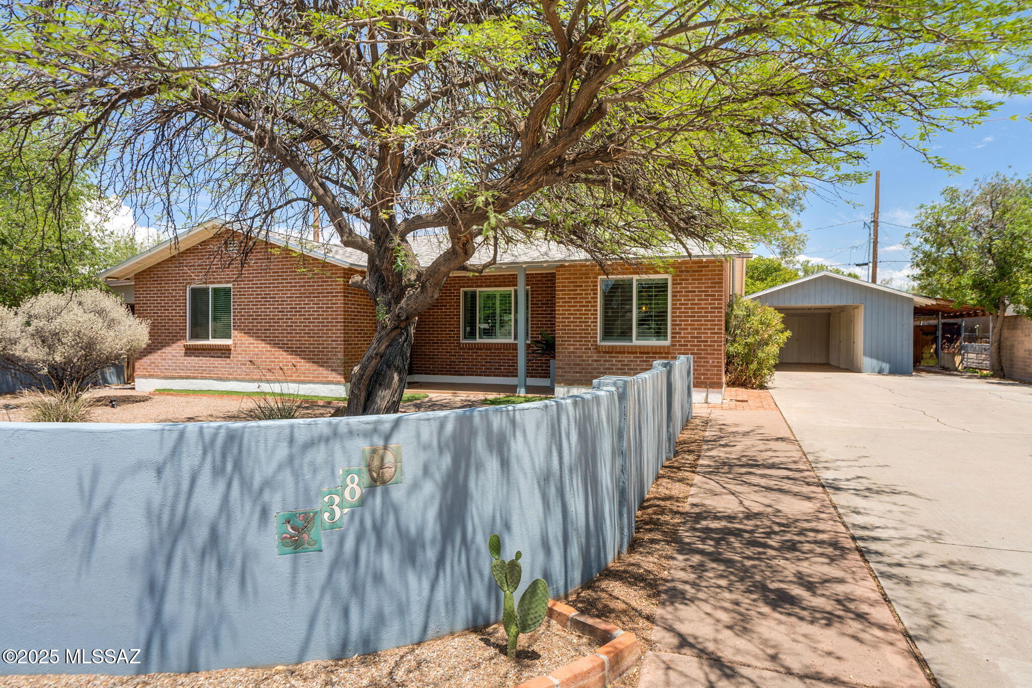 Turn Key, charming 3 bedroom/2 full bath home in Poets corner. Completely remodeled w/every attention to keeping the original feel, yet all the benefits of being newer. 2021 Newer A/C, 2023 Newer Dual Pane Windows installed throughout, & Newer Water heater too. Wood look floors, Light & Bright bathrooms, crisp white kitchen accented by soft blue accents, stainless appliances, quartz countertops, double sink with disposal, electric range/oven with vent. Full laundry room w/washer/dryer, Walk in closets & 2 covered tandem parking spots with storage to boot. Sweet front yard with a mature mesquite tree, half wall & covered front porch. Large walled back yard with grassy area, deep covered back patio, and room for pool or spa, Rare find for this age home.. come take a look pride of ownership