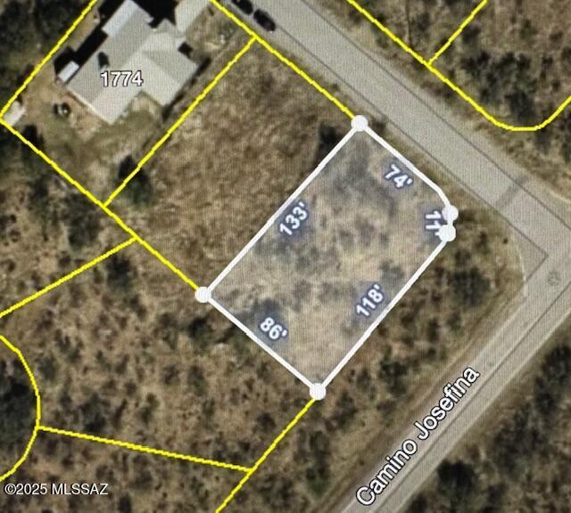 Discover the perfect balance of peaceful rural living and everyday convenience with this beautiful 0.25-acre parcel in Rio Rico. Surrounded by stunning mountain views, this buildable lot offers a serene setting ideal for your dream home or getaway. Just a short drive from local necessities, yet tucked away enough to enjoy the quiet charm of the countryside. Don't miss your chance to own a slice of Arizona paradise!