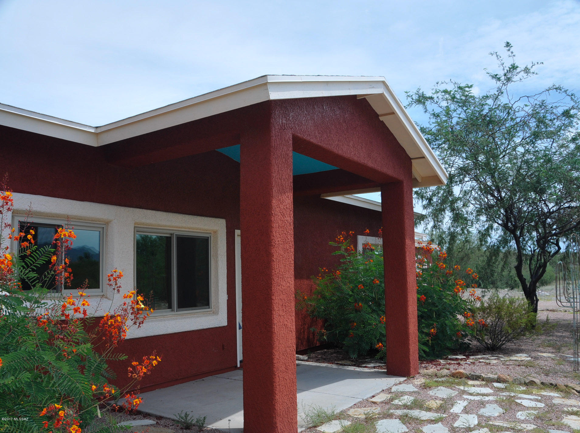 A MUST SEE.PRICED FOR A QUICK SALE.Tucked away at the end of the street, this home sits on 3.6 acres with expansive City & Mountain Views. An 80ft covered patio allows you to enjoy the outdoors & the views at the same time. Windows from each room shows off this scenery.Almost all windows are triple Pane.Living room with a fireplace open floor plan,kitchen & breakfast bar. An additional large great room allows  for entertainment, media room, artist studio, crafts, a pool table or anything that meets your needs.Behind the garage & off the spacious laundry room, there is an extra bonus room which is perfect for an office or guest room.Split floor plan with a large master suit takes advantage of the views!Master bathroom is large with a huge closet. Lots of possibilities with this home due to the extra room off the laundry and the large den/studio near the garage.  You can section off part of that room for a bedroom and the room and there is enough space in the laundry to add a small bathroom as part of the extra bonus room.