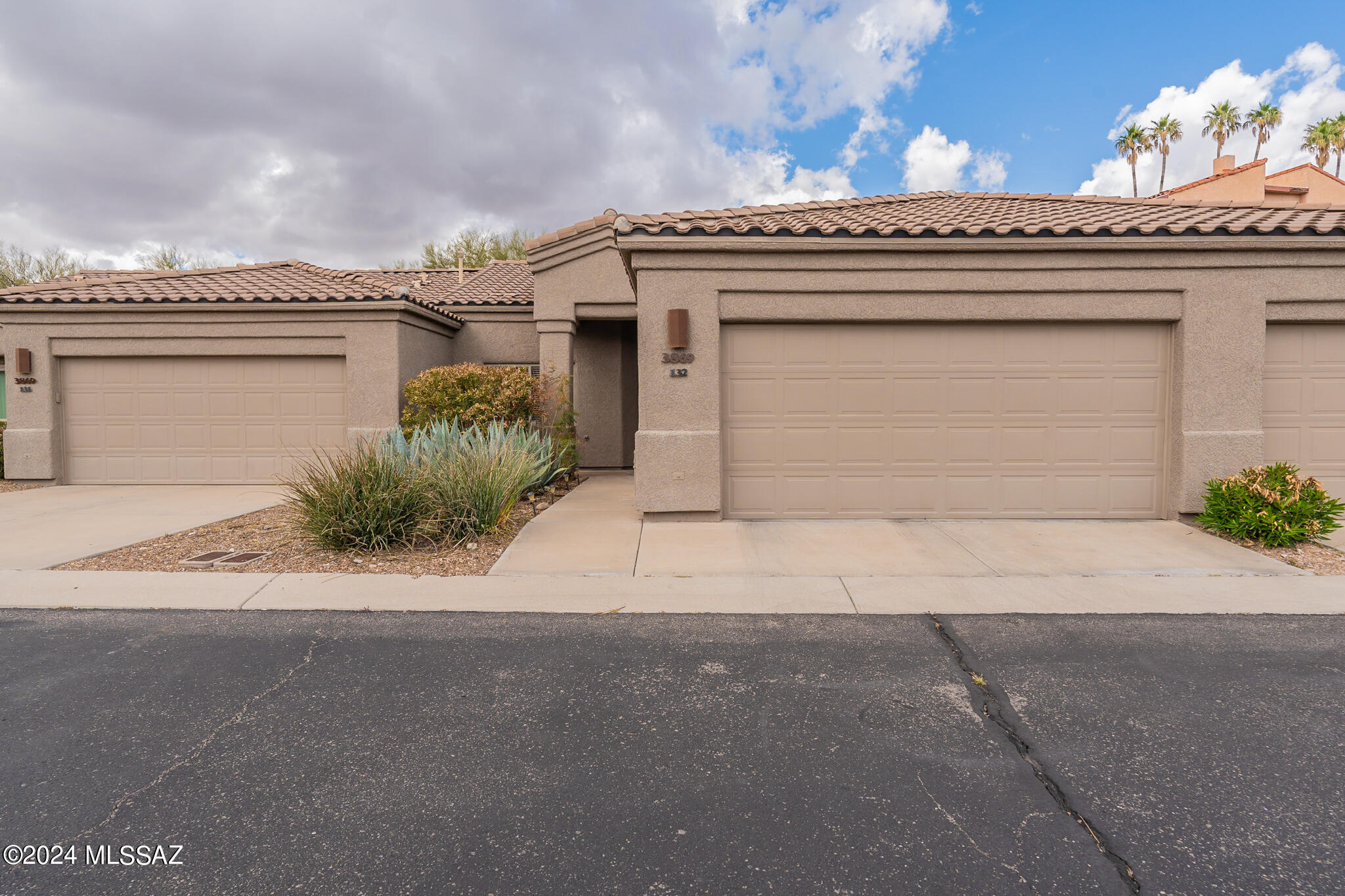 A terrific and affordable opportunity for Foothills full-time or ''Snowbird'' living, or an excellent investment/rental property, in a dynamic, well-located area is now available. This well-maintained townhome is located near Whole Foods and excellent restaurants, with easy access to downtown, the U of A & River Walk. There's an updated kitchen with newer handsome countertops and cabinets, a gas stove, breakfast bar and pantry. A covered patio, accessible from the great room and primary bedroom, is very private. The primary bedroom is amply sized, with a walk-in closet and double sinks with handsome mirrors in the primary bath. A two-car garage includes built-in storage. An ample second bedroom enjoys a full bath.  The community pool provides exercise and relaxation options. All furnishings are included in the sale. The HOA covers termites, roof,  and more. Please call for your appointment to see this comfortable townhome today.
