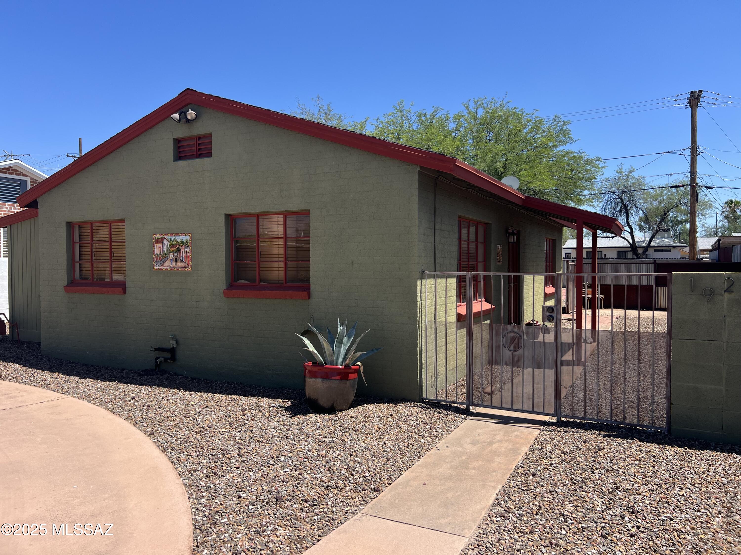 Fantastic location. The Woodland Park neighborhood is situated very close to the U of A campus and medical center.  Home features great historical charm and a large R-2 lot with potential for ADU.
Additional features include newer 2.5 ton 15 SEER Carrier HVAC (06/2022). Fresh composition shingle roof (03/23) with 3 year warranty. New water heater (09/2024). Rear yard also has a large Tuff Shed storage unit (05/22). Woodland Park is just a short stroll to the Campbell Avenue culinary corridor. This area is known for its diverse and vibrant culinary scene, featuring a mix of local and national businesses catering to various tastes and preferences.  With a little TLC, this home will shine like a diamond. A must see!