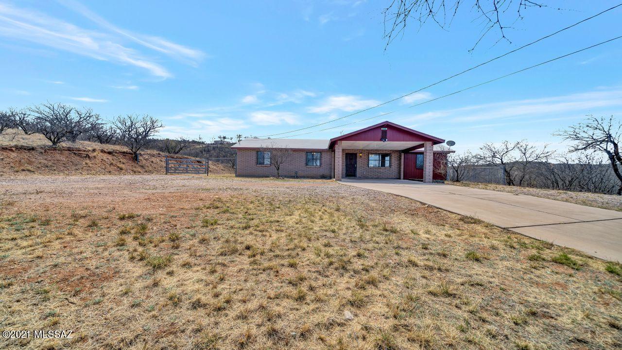 Single Family Residence - Brick with 3BR, 2BA + Family Room, enclosed Porch, and Double Carport.  Great Mountain top views!  All Tile flooring throughout, Updated Bathrooms.  Interior has been freshly painted (March of 2021) with semi-gloss paint.  Kitchen is ready for you to upgrade and make it your own style.  New HVAC installed April, 2021.
Storage Building on premises.  
Adjacent Lot (551 Paseo Palomino) next door to west is part of this sale.  This lot gives owner of 553 Paseo Palomino additional room and privacy.
Estate has already gone through probate.
Septic has been certified.  Please call listing agent for full septic certification/inspection documents.
