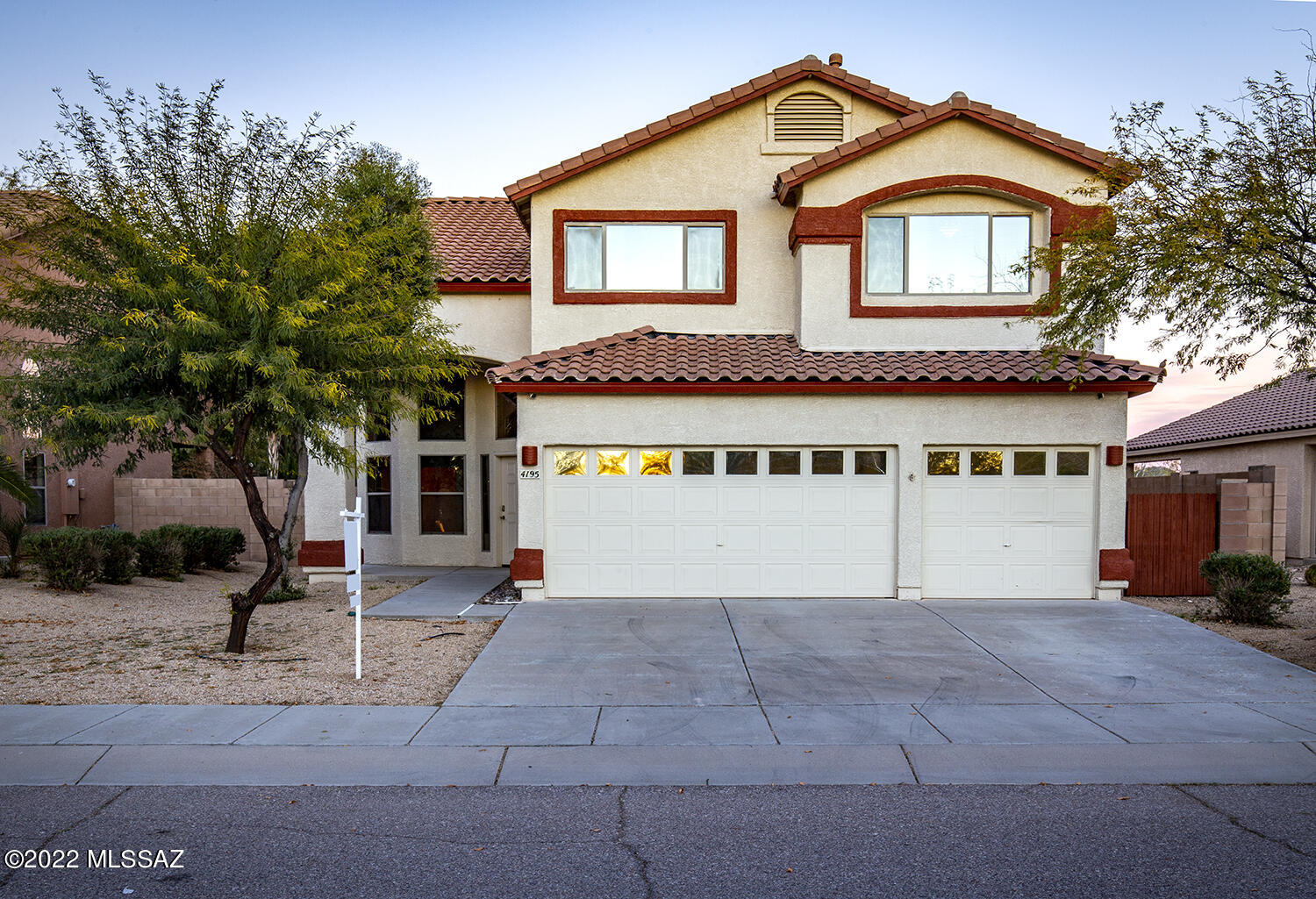 This spacious home has been meticulously maintained over the years. Have fun decorating every inch of this 3 bed + loft/2.5 bath home, feel like royalty with 19' entryway ceilings, abundant natural lighting, and a wooden banister leading to the second floor. With so many rooms you're not limited to bedrooms, imagine your perfect flex space and make it yours. The kitchen has all the amenities including stainless steel appliances, granite countertops, recessed lighting, and plenty of cupboard space. Enjoy the patio on either the upper or lower level, it's the perfect place for enjoying the stunning mountain views. The walled yard is built up with blocks for additional privacy. This contemporary home is an absolute must-see!