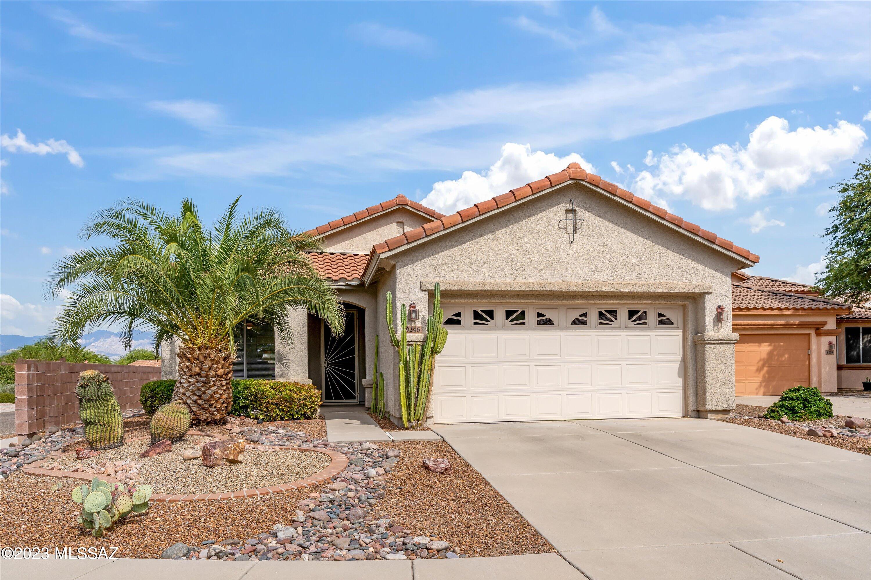 Fabulous location with an East-facing backyard & gorgeous views of the Catalina Mountains. This 2bd 2 ba Sierra model has been recently painted throughout. The great room features an open & spacious living & dining space with gas fireplace & built-in shelving. The kitchen has a new sink, newer frig, microwave & includes a breakfast bar & nook. The primary bedroom is spacious w/bay window, 2 closets, a walk-in & 1 standard. Upper storage cabinets in garage above the laundry tub. Many fun activities await you at the Village Center. Close to shopping, restaurants, medical, I-10 and The Loop (for outdoor enthusiasts).