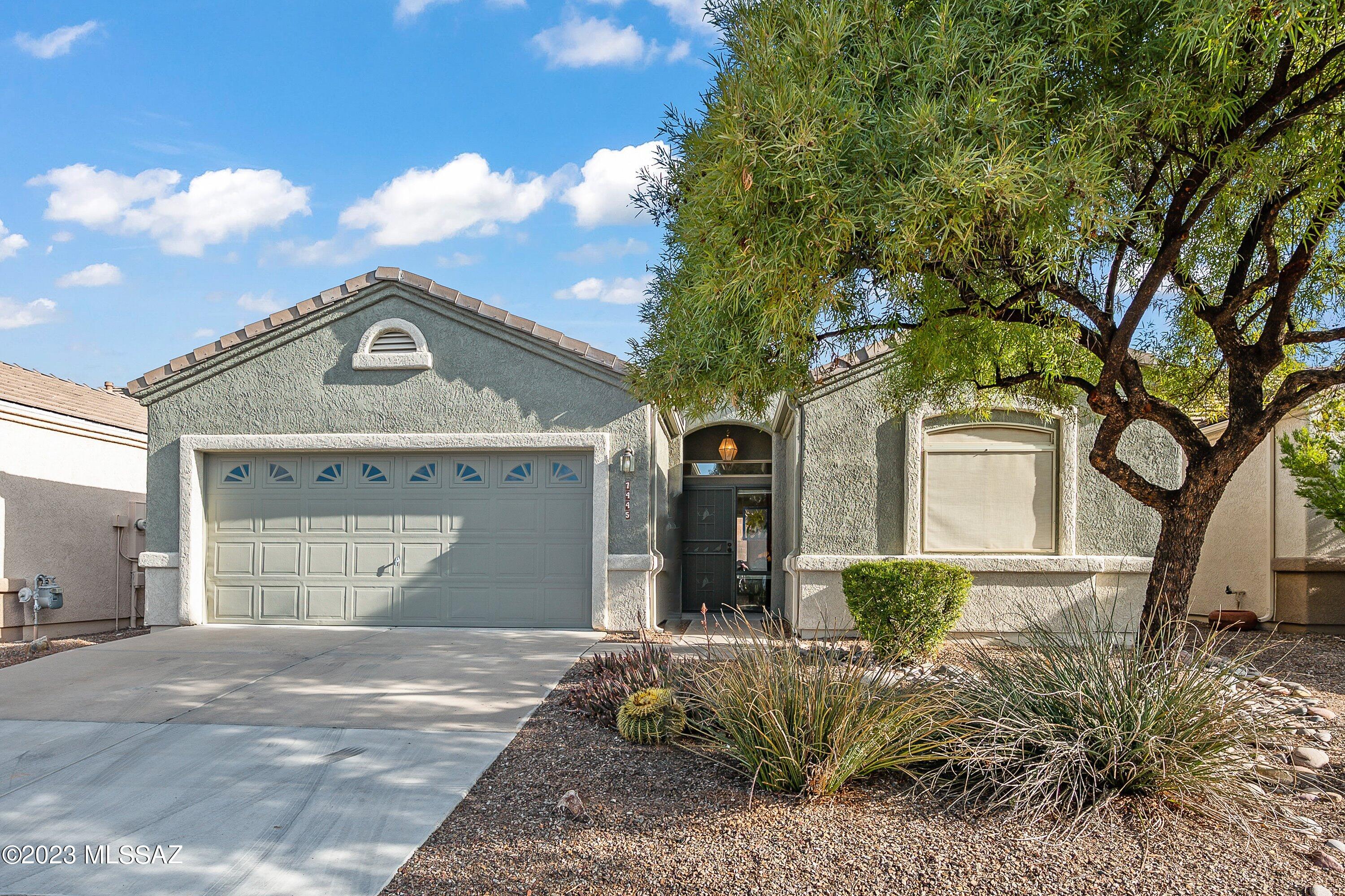 This charming, light & bright home features the sought after Bristol floor plan - split bedrooms & laundry room inside the home & comes FURNISHED! Exterior professionally painted Jan 2023. Open floor plan w/ vaulted ceiling and skylight.  The kitchen has a large island w/ overhang for stools, plenty of cabinets & counter space that opens into the great room/dining area.  The large primary has an extended den/sitting space (110 sq ft) w/ slider to the outside patio.  Primary bathroom has executive height double sinks w/ a huge walk-in closet.  The second bedroom is oversized & features a pocket door to the bathroom for added privacy.  Relax outside on the large covered patio listening to the trickling waterfall & low maintenance yard, So much to enjoy in this home and the Cove community!