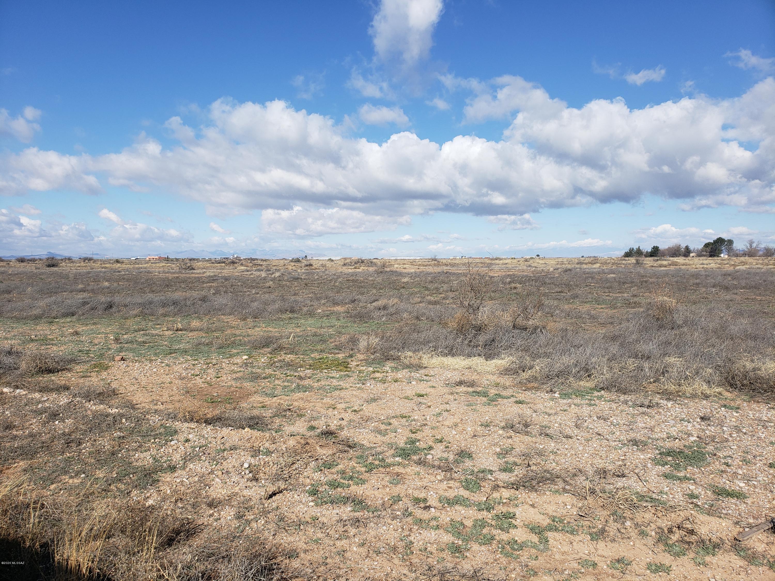 Raw 40 acres of FLAT Usable/ Build-able Land, Corner Lot.  Spectacular Mountain views, perfect for viewing the stars!!, Perfect location to Build a home!!  Located in the Heart of Willcox Wine Country and Home to Famous Rex Allen and Marty Robbins. Electrical is right there and easy to connect into and the Main Road into the property is COUNTY Maintained!!   A Major Plus in that area!!
