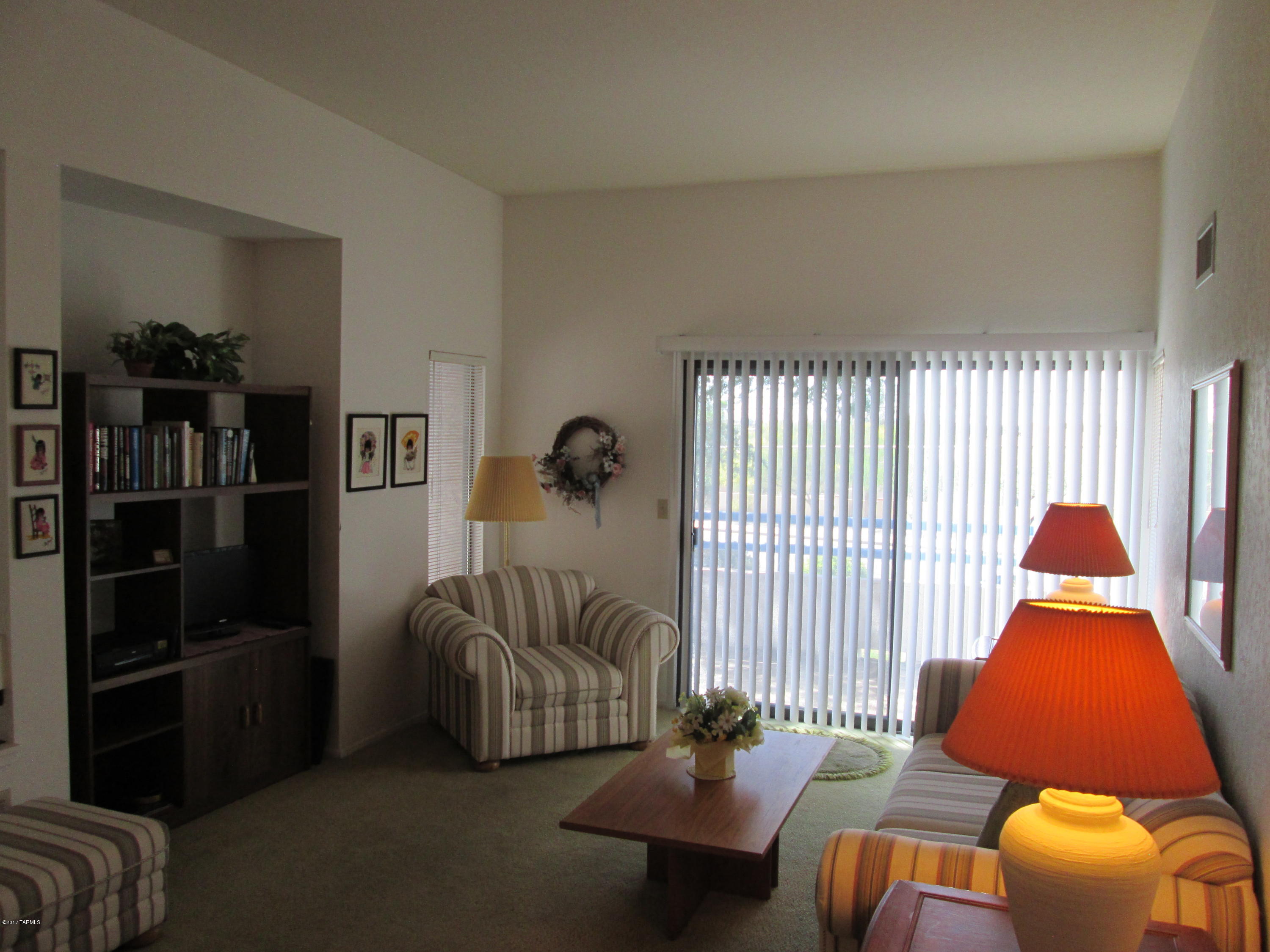Priced to sell! Popular second floor 2 bedroom model. Light, bright, cozy. Needs cosmetic updating including carpeting. Two community pool, one reserved covered parking space. HOA covers water, sewer, trash, common area, two community pools, roof, termite and exterior building maintenance and common area insurance. All furniture & appliances convey on a separate bill of sale for $1 contingent on close of escrow. Personal items will be removed prior to change of ownership.