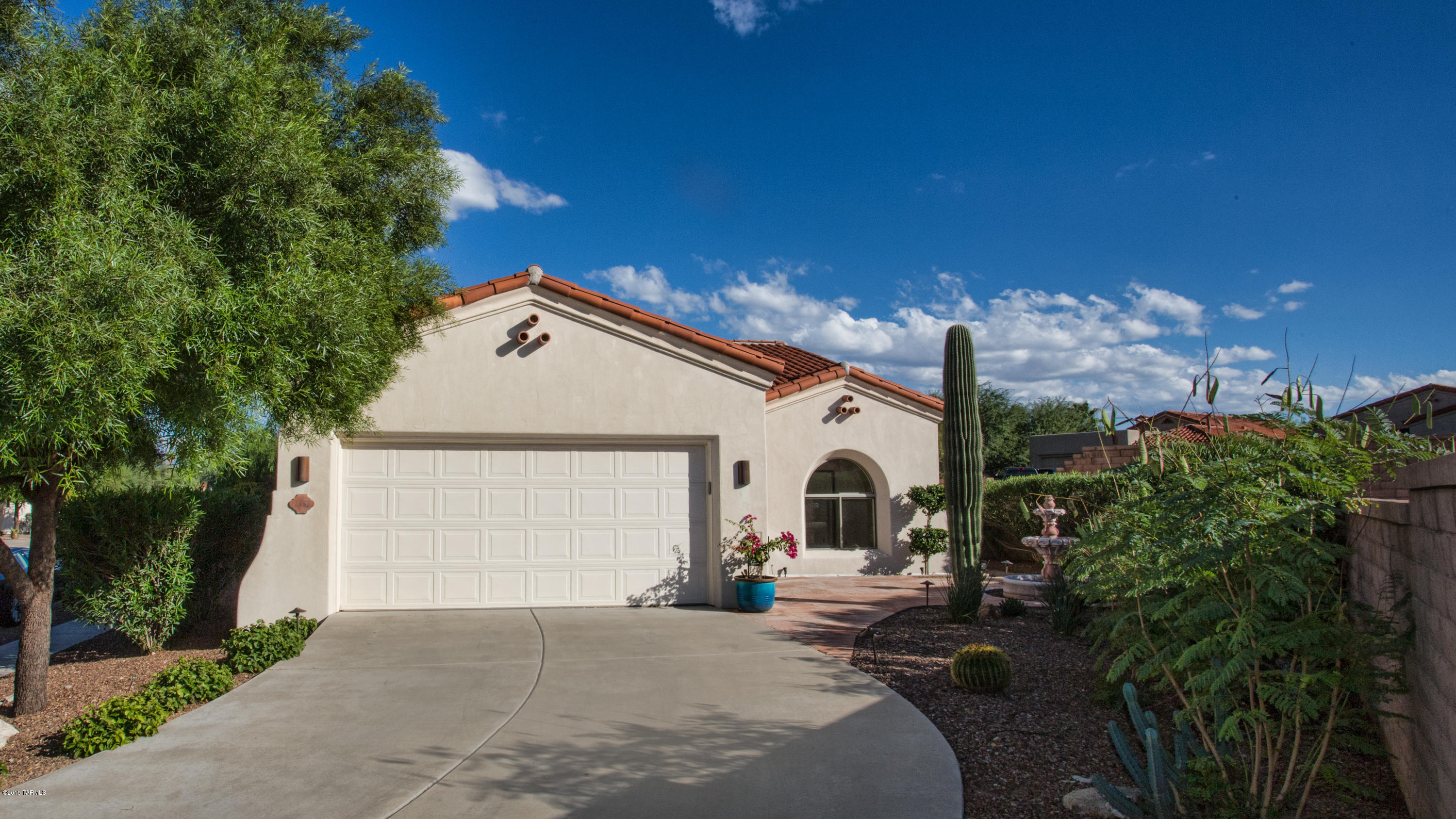 Gorgeous southwestern style home in Vactor Ranch gated community. Close to shopping, schools, and restaurants. Beautifully landscaped backyard with pool/spa and outside fireplace, many upgrades: A/C, water filter system, hot water heater.