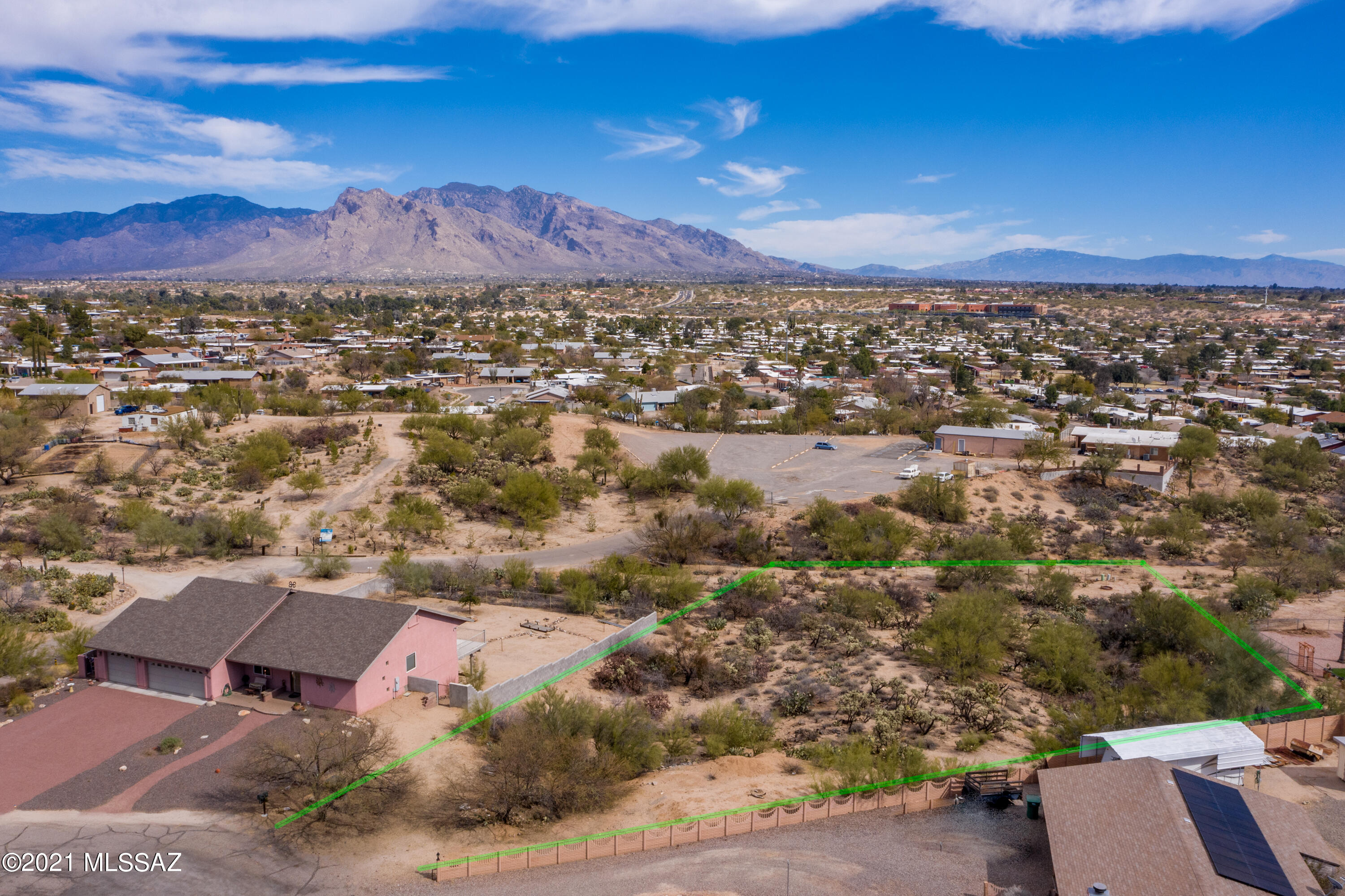 Build your own private hideaway in Northwest Tucson on this incredible lot and enjoy Mountain and City views. Water, sewer, phone, electricity, and gas are ALL available on site. This unique property is nestled in a subdivision with NO HOA and close to Northwest Hospital and 1-10. Call today for more info on the what this property has to offer!

Lot lines shown in MLS photos are reliable but not guaranteed. These photos are for information purposes only and may not represent actual lot lines. Photos are not a substitute for a field survey. The precise location of property boundaries on the ground must be determined by buyer.