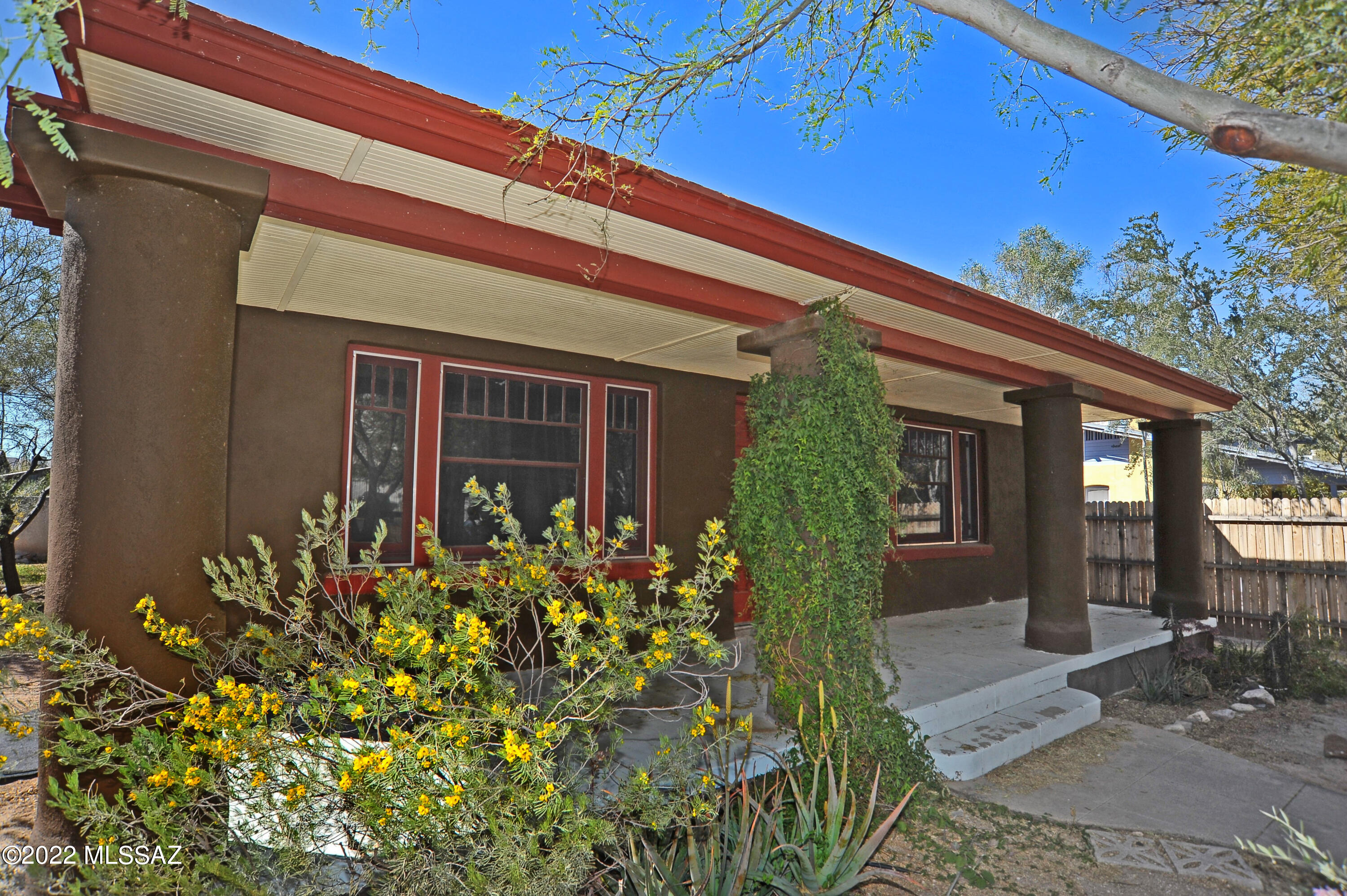 Charming bungalow with guest house in the historic sought after Dunbar Springs Neighborhood! Main house is 1132 sqft with 2 bedrooms and 2 bathrooms boasting hardwood floors recycled from the Dunbar School gym, custom cabinetry, large bedrooms with craftsman built-ins, and new HVAC in 2019. The 1 bedroom/1 bathroom guest house features saltillo tile in the common areas and wood flooring in the 1950 bedroom addition. Mini split heating/cooling was added in 2019. Both homes are metered separately for electric, gas, and water. This gives you the opportunity to live in the main house and rent out the back or visa versa. Large lot with shared laundry. This artsy and active community has a lot to offer where the neighbors have created a community garden. You can find out more on the community at the Dunbar website. Call to schedule an appointment today.