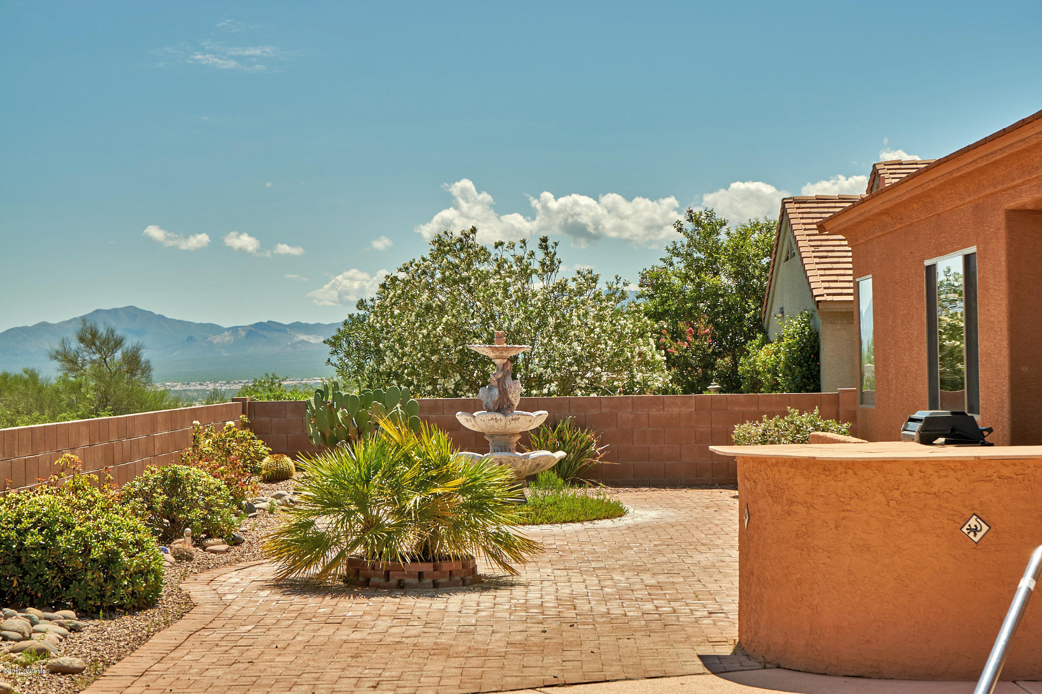Must See! This beautiful open floor plan has great room, formal living room, formal dining room, 3 bedrooms, and 2 baths. Private swimming pool, and built-in barbeque all this backing up to open space, with great mountain views.