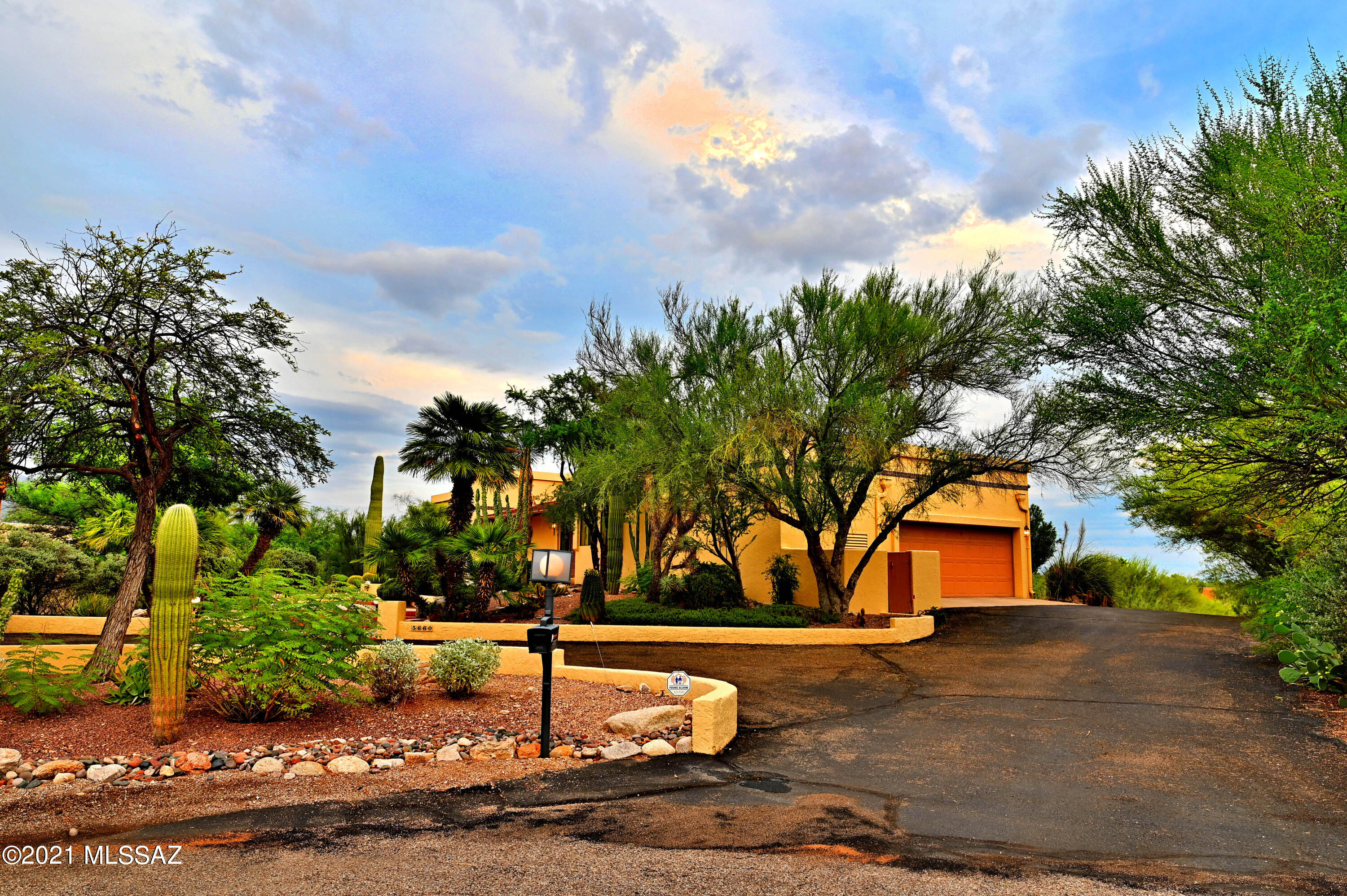 Amazing Foothills living in this large (over 3500sf) updated 1+ Acre; Mountain views to northeast and complementary City views to the south this is a Shadow Hills masterpiece property. Inside large rooms make for superb entertaining spaces, (The custom vaulted tongue and groove ceiling make for an impressive entrance.), abundant natural lighting from premium oversized windows look out to pristine desert from almost every window. Split bedroom plan allows for privacy. Outside a 2 car garage with massive amounts of storage and a 1/2 bath allow for car aficionados or those that just need space. A gigantic pool and solar heater provide fun. Patio space offers a wealth of space and fun for everyone! This house is a real standout and it's priced to sell. Schedule your showing today!